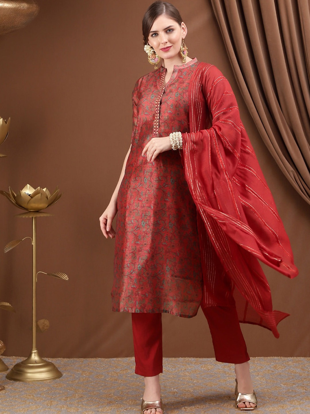 Bani Women Women Rust Floral Printed Chanderi Cotton Kurta with Trouser & With Dupatta
Bani Women Women Rust Floral Printed Chanderi Cotton Kurta with Trouser & With Dupatta