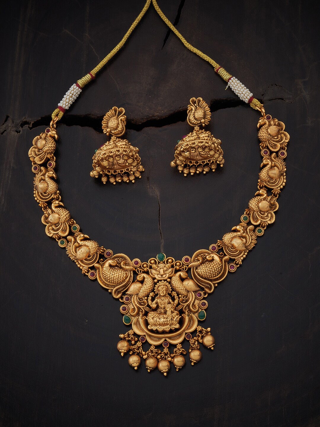 Kushal's Fashion Jewellery Green & Gold-Plated Ruby Antique Stone Studded Jewellery Set
Kushal's Fashion Jewellery Green & Gold-Plated Ruby Antique Stone Studded Jewellery Set