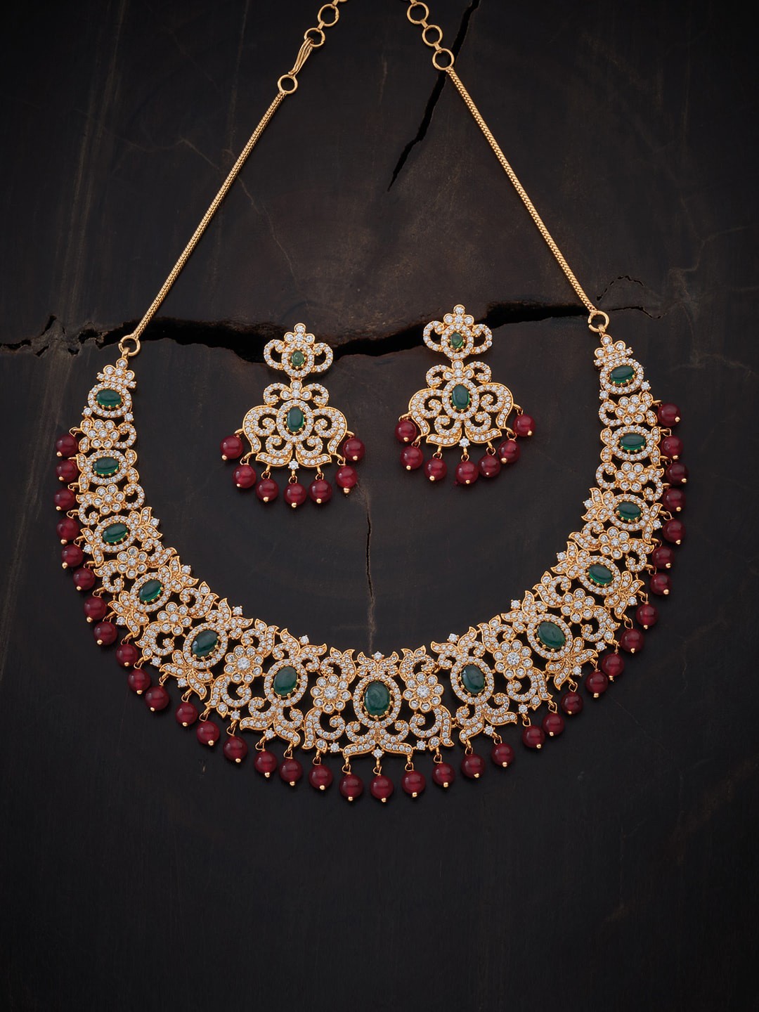 Kushal's Fashion Jewellery Women Gold & Red Gold-Plated Cubic Zirconia Copper Jewellery Set
Kushal's Fashion Jewellery Women Gold & Red Gold-Plated Cubic Zirconia Copper Jewellery Set
