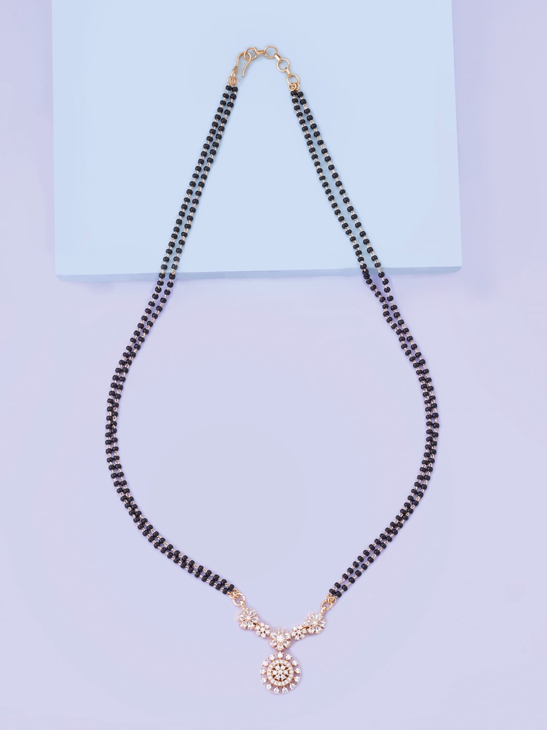 Kushal's Fashion Jewellery White & Black Gold-Plated Beaded & Stones-Studded Mangalsutra, Rose gold
Kushal's Fashion Jewellery White & Black Gold-Plated Beaded & Stones-Studded Mangalsutra, Rose gold