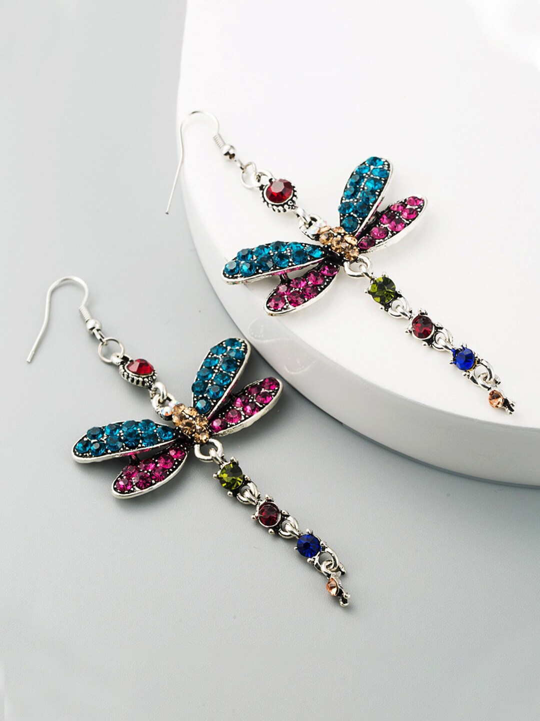 Yellow Chimes Silver-Plated Blue & Pink Butterfly Designed Crystal Studded Drop Earrings
Yellow Chimes Silver-Plated Blue & Pink Butterfly Designed Crystal Studded Drop Earrings