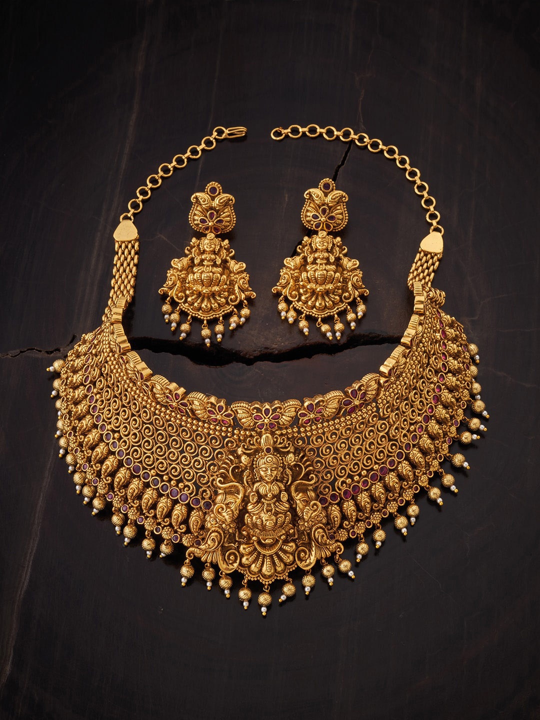 Kushal's Fashion Jewellery Gold-Toned White & Red Stone-Studded & Pearl Beaded Jewellery Set
Kushal's Fashion Jewellery Gold-Toned White & Red Stone-Studded & Pearl Beaded Jewellery Set