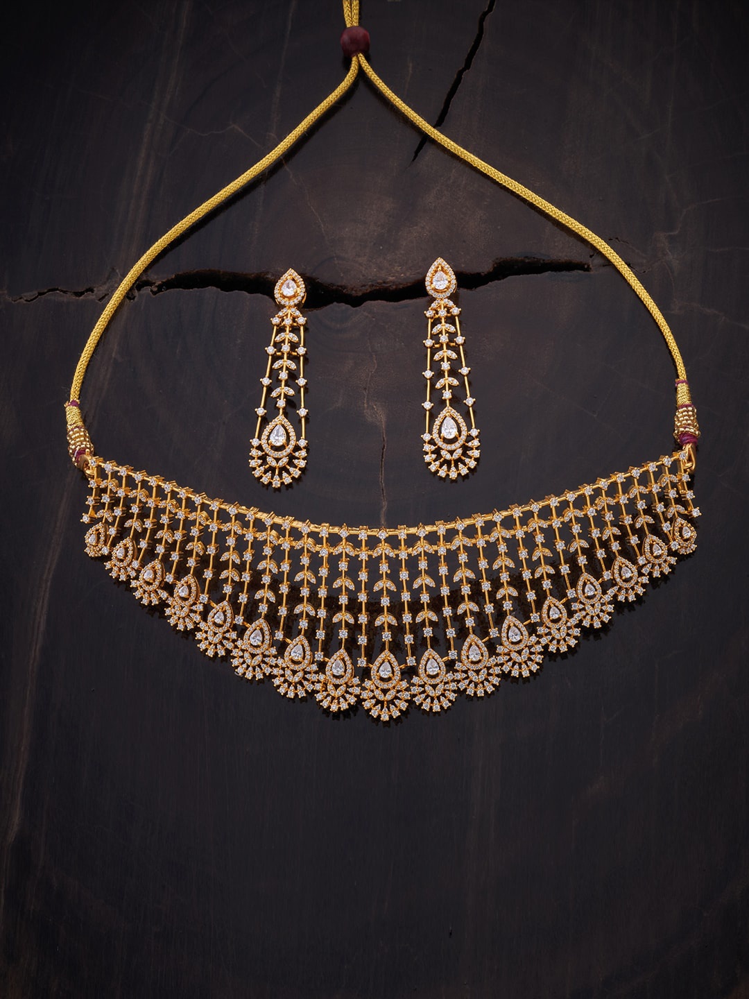 Kushal's Fashion Jewellery Gold-Plated White Artificial Stones-Studded Jewellery Set
Kushal's Fashion Jewellery Gold-Plated White Artificial Stones-Studded Jewellery Set