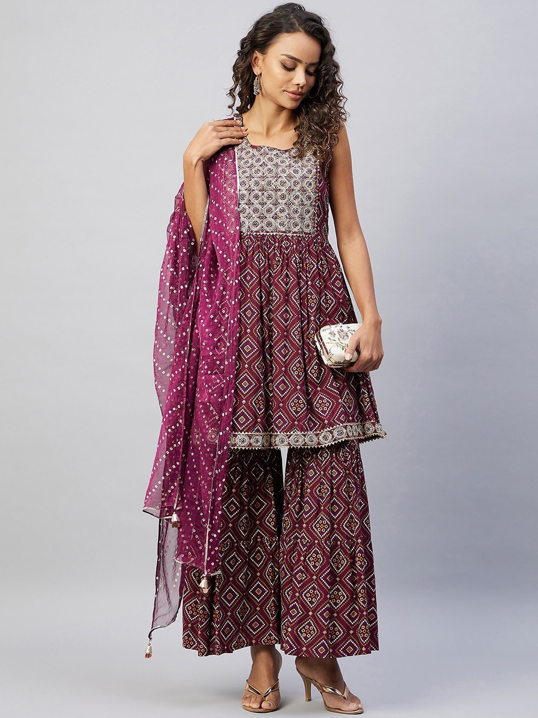 InWeave Women Purple Bandhani Embroidered Pleated Gotta Patti Kurti with Sharara & With Dupatta
InWeave Women Purple Bandhani Embroidered Pleated Gotta Patti Kurti with Sharara & With Dupatta