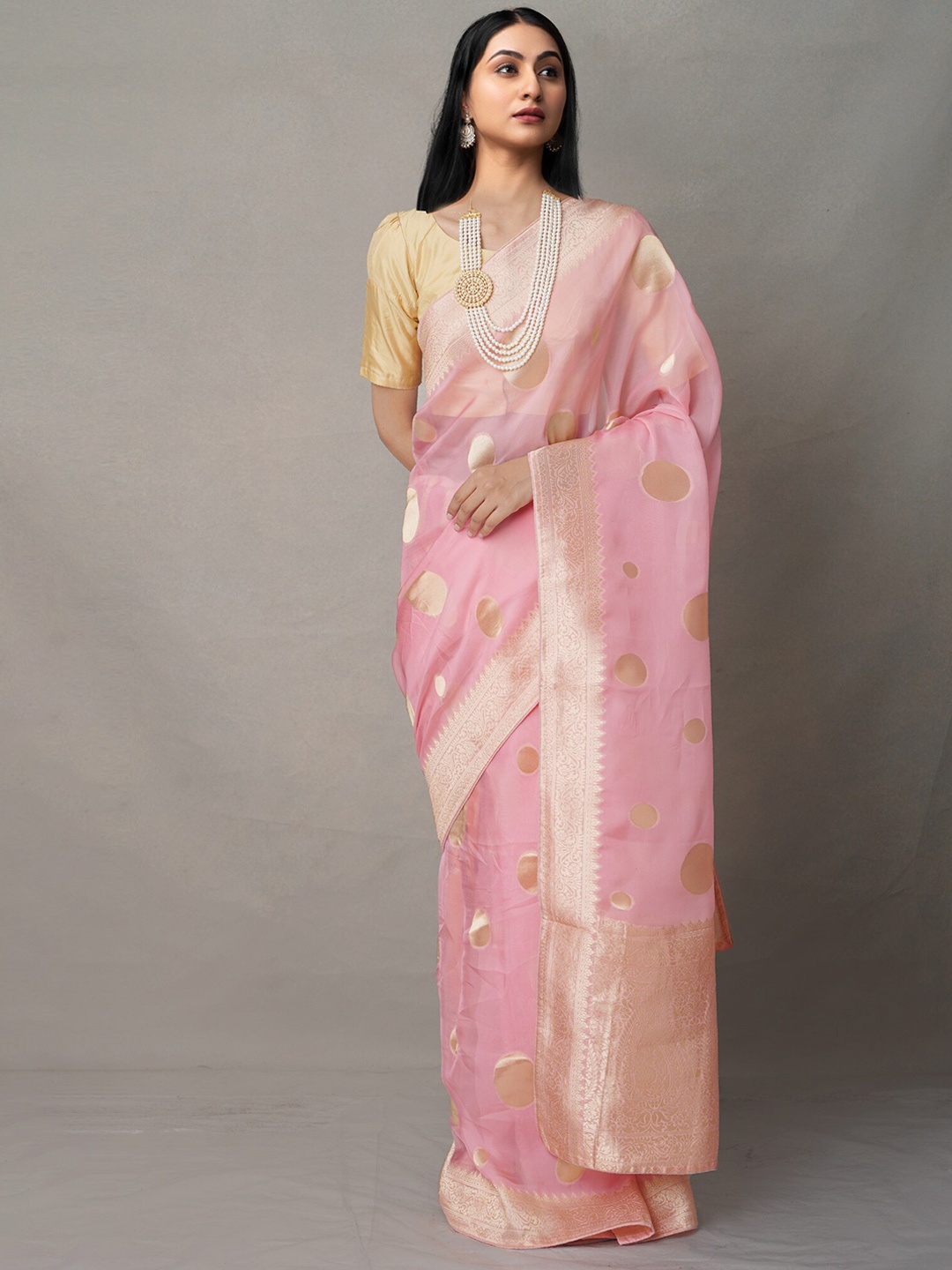 Unnati Silks Peach-Coloured & Gold-Toned Ethnic Motifs Zari Pure Silk Banarasi Saree
Unnati Silks Peach-Coloured & Gold-Toned Ethnic Motifs Zari Pure Silk Banarasi Saree