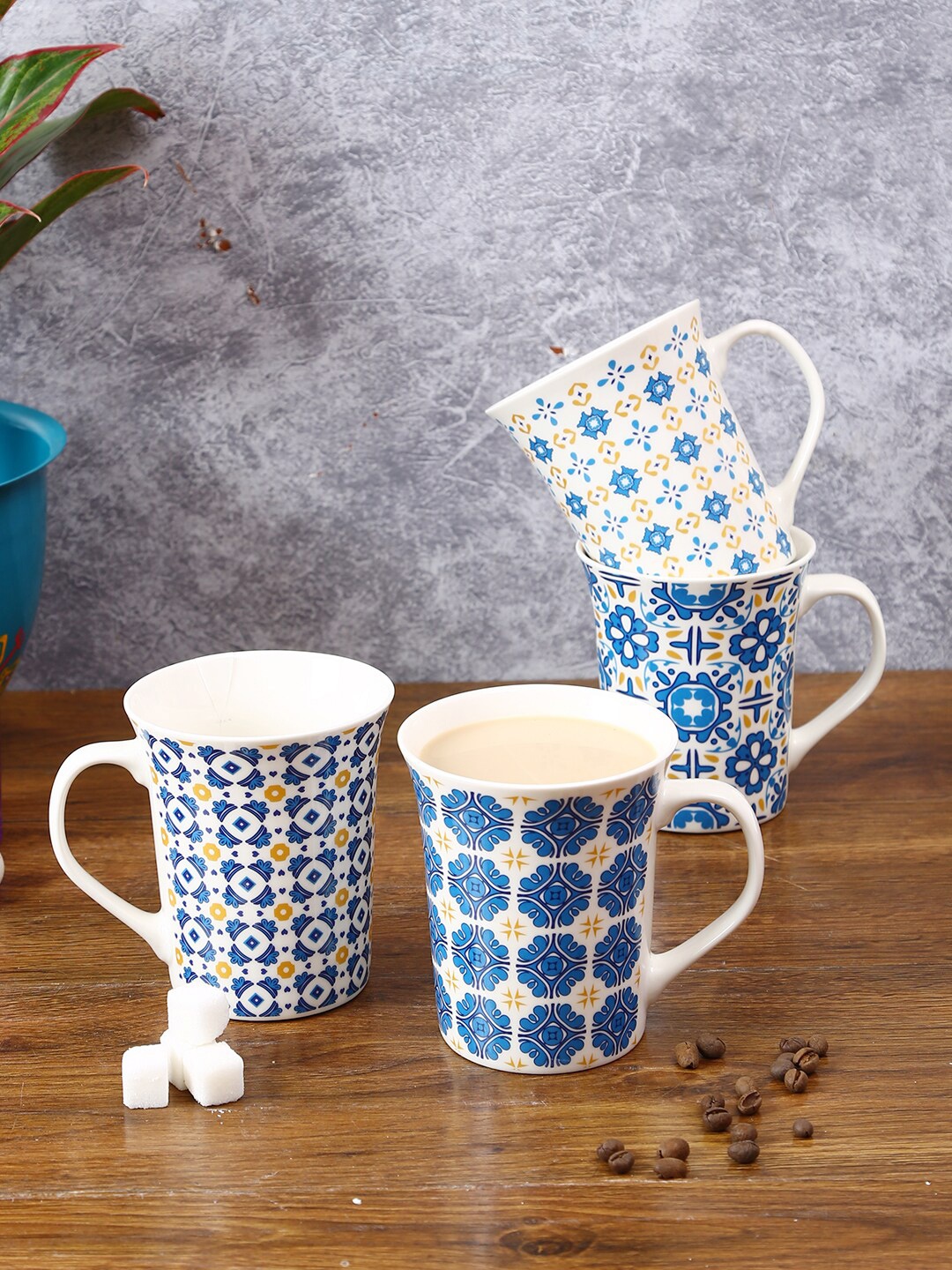 House Of Accessories Blue & White Set of 4 Printed Bone China Glossy Mugs 350 ml Each
House Of Accessories Blue & White Set of 4 Printed Bone China Glossy Mugs 350 ml Each