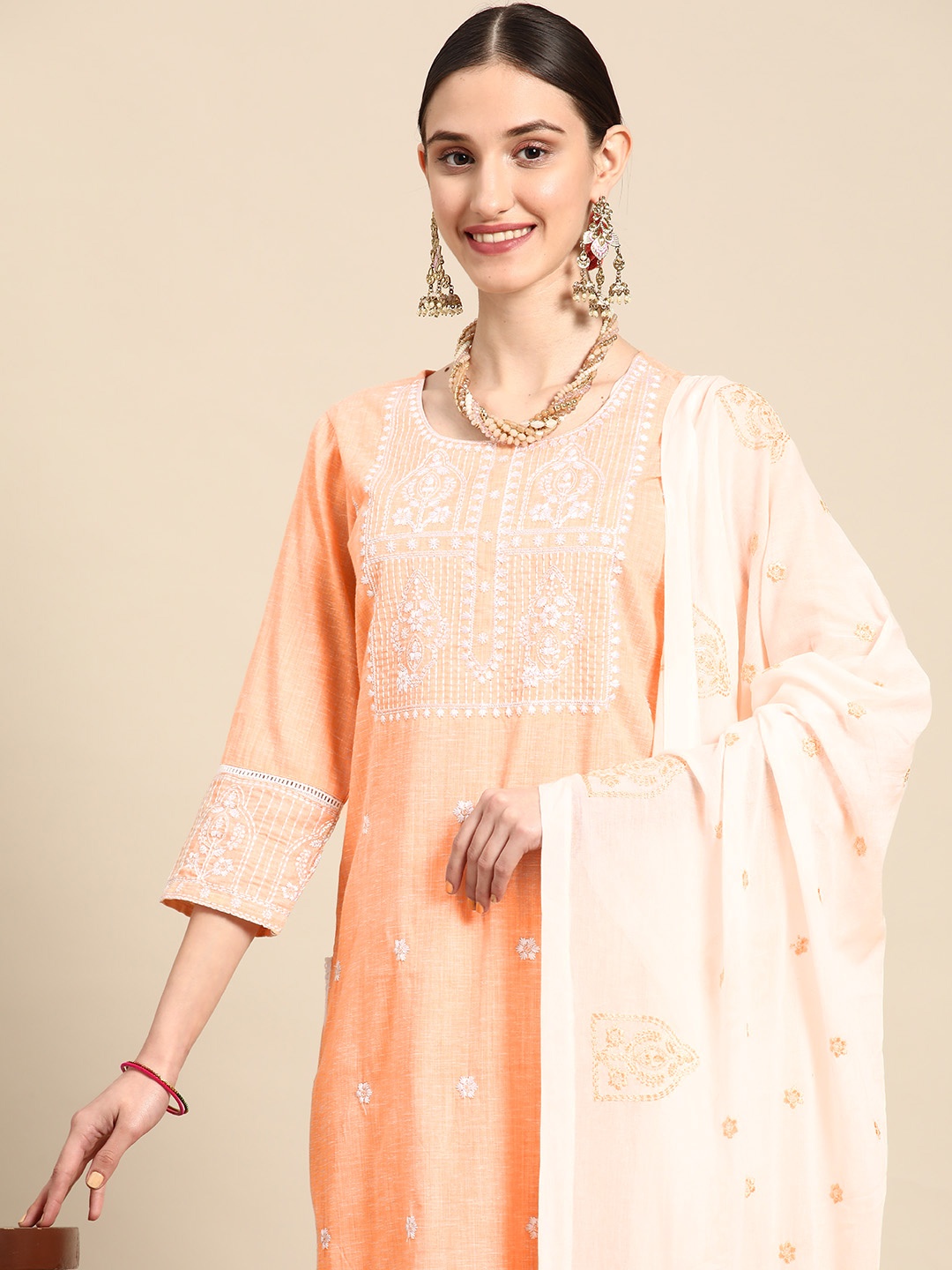 Sangria Women Peach-Coloured Floral Yoke Design Pure Cotton Kurta with Trousers & With Dupatta
Sangria Women Peach-Coloured Floral Yoke Design Pure Cotton Kurta with Trousers & With Dupatta