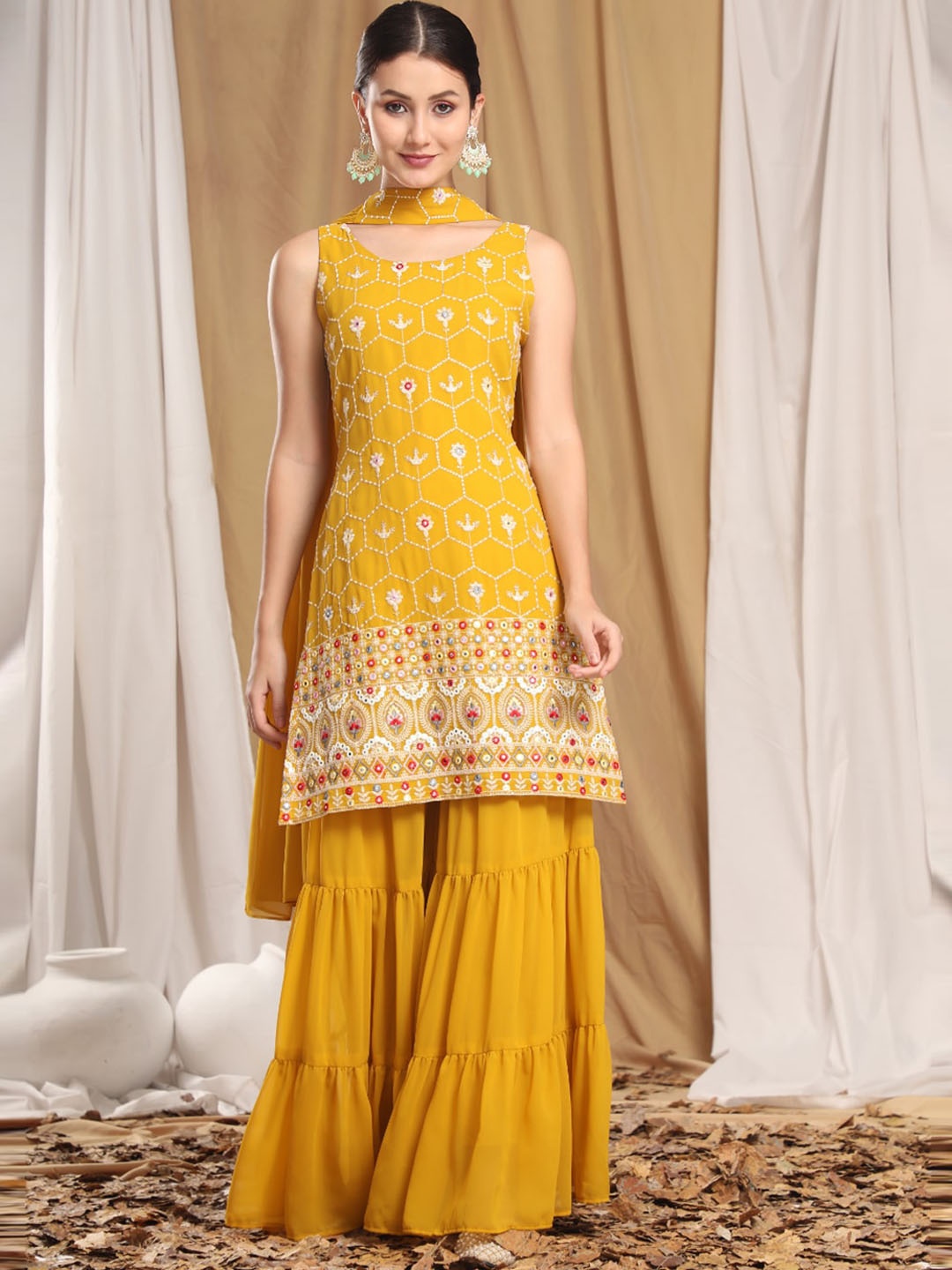 KALINI Women Mustard Yellow Floral Embroidered Mirror Work Kurti with Sharara & With Dupatta
KALINI Women Mustard Yellow Floral Embroidered Mirror Work Kurti with Sharara & With Dupatta
