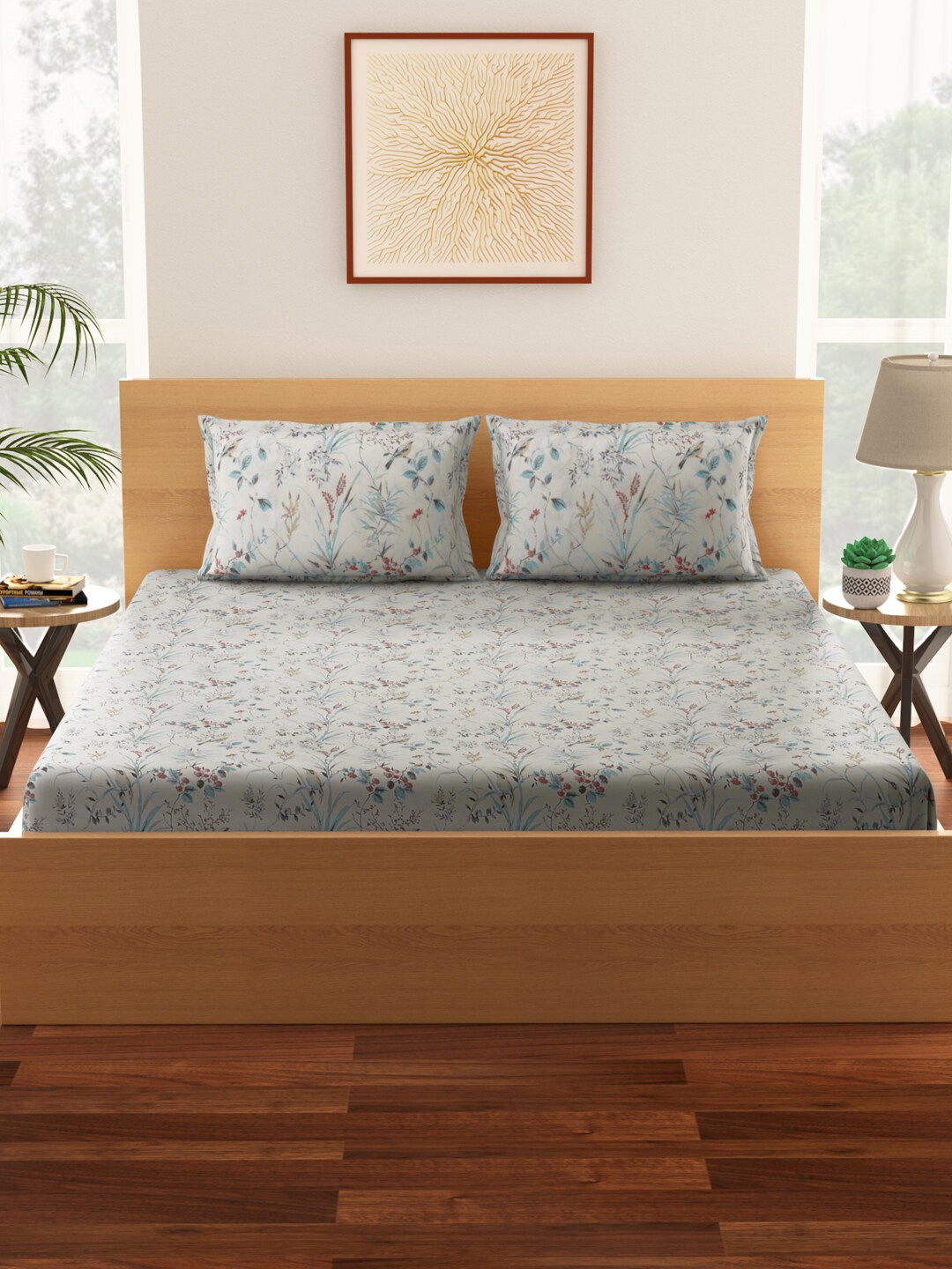 Living scapes by Pantaloons Off White & Blue Floral 144 TC King Bedsheet with 2 Pillow Covers
Living scapes by Pantaloons Off White & Blue Floral 144 TC King Bedsheet with 2 Pillow Covers