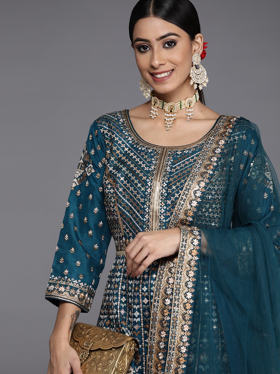 Libas Women Teal Floral Embroidered Sequinned Pure Silk Kurta with Sharara & With Dupatta
Libas Women Teal Floral Embroidered Sequinned Pure Silk Kurta with Sharara & With Dupatta