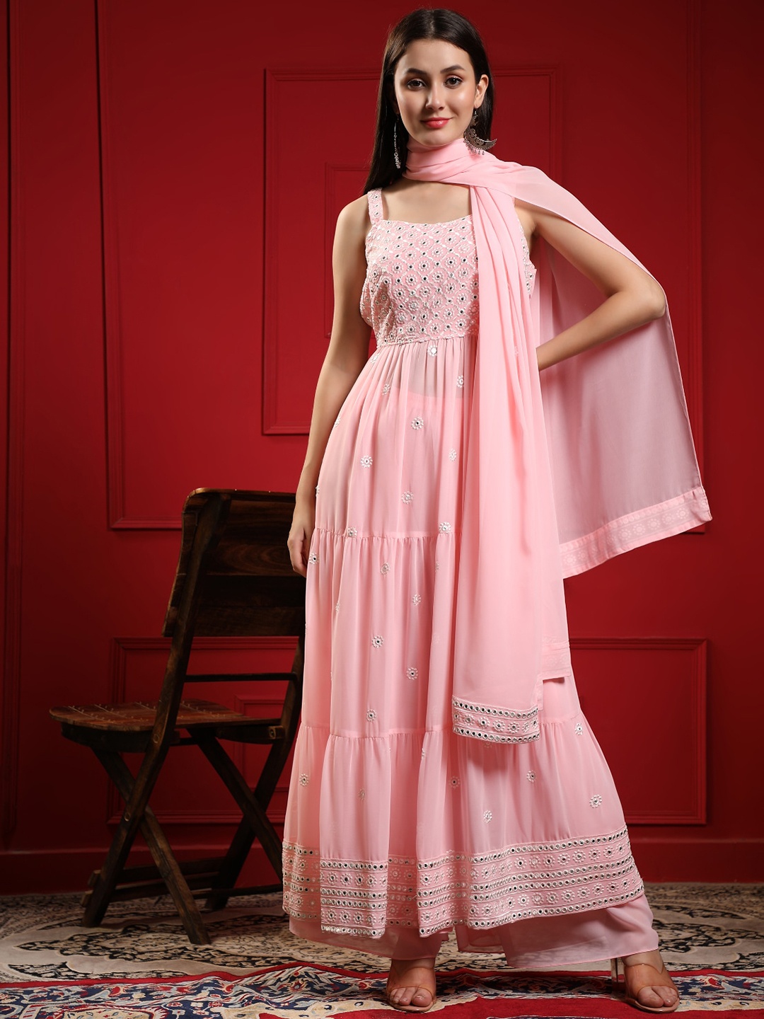 KALINI Women Pink Floral Embroidered Pleated Mirror Work Kurta with Sharara & With Dupatta
KALINI Women Pink Floral Embroidered Pleated Mirror Work Kurta with Sharara & With Dupatta