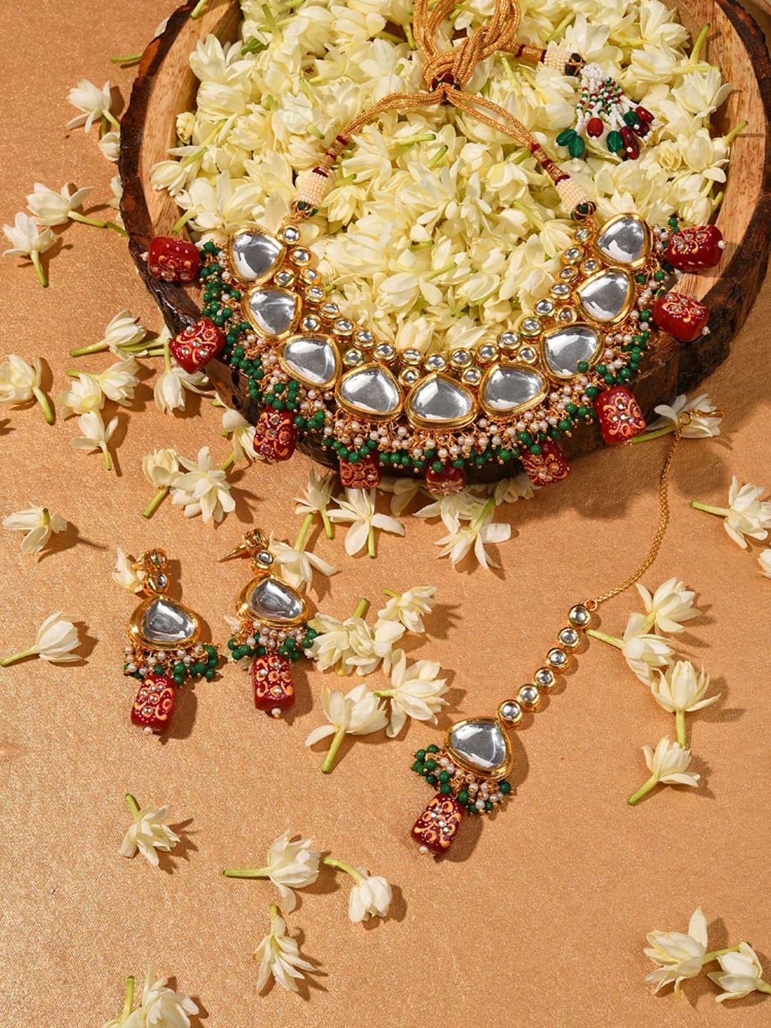 SOHI Women Gold-Plated Multicolored Kundan-Studded & Beaded Jewellery Set
SOHI Women Gold-Plated Multicolored Kundan-Studded & Beaded Jewellery Set
