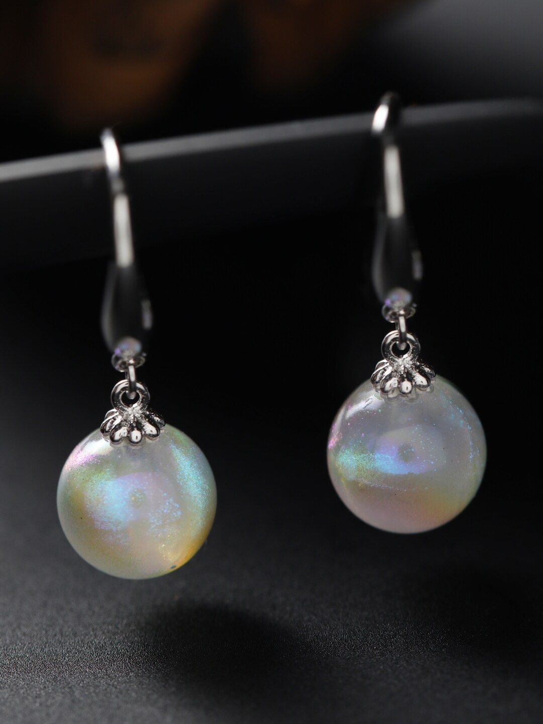 SHEER by Priyaasi Silver-Toned & White Pearl Studded Silver-Plated Drop Earrings
SHEER by Priyaasi Silver-Toned & White Pearl Studded Silver-Plated Drop Earrings