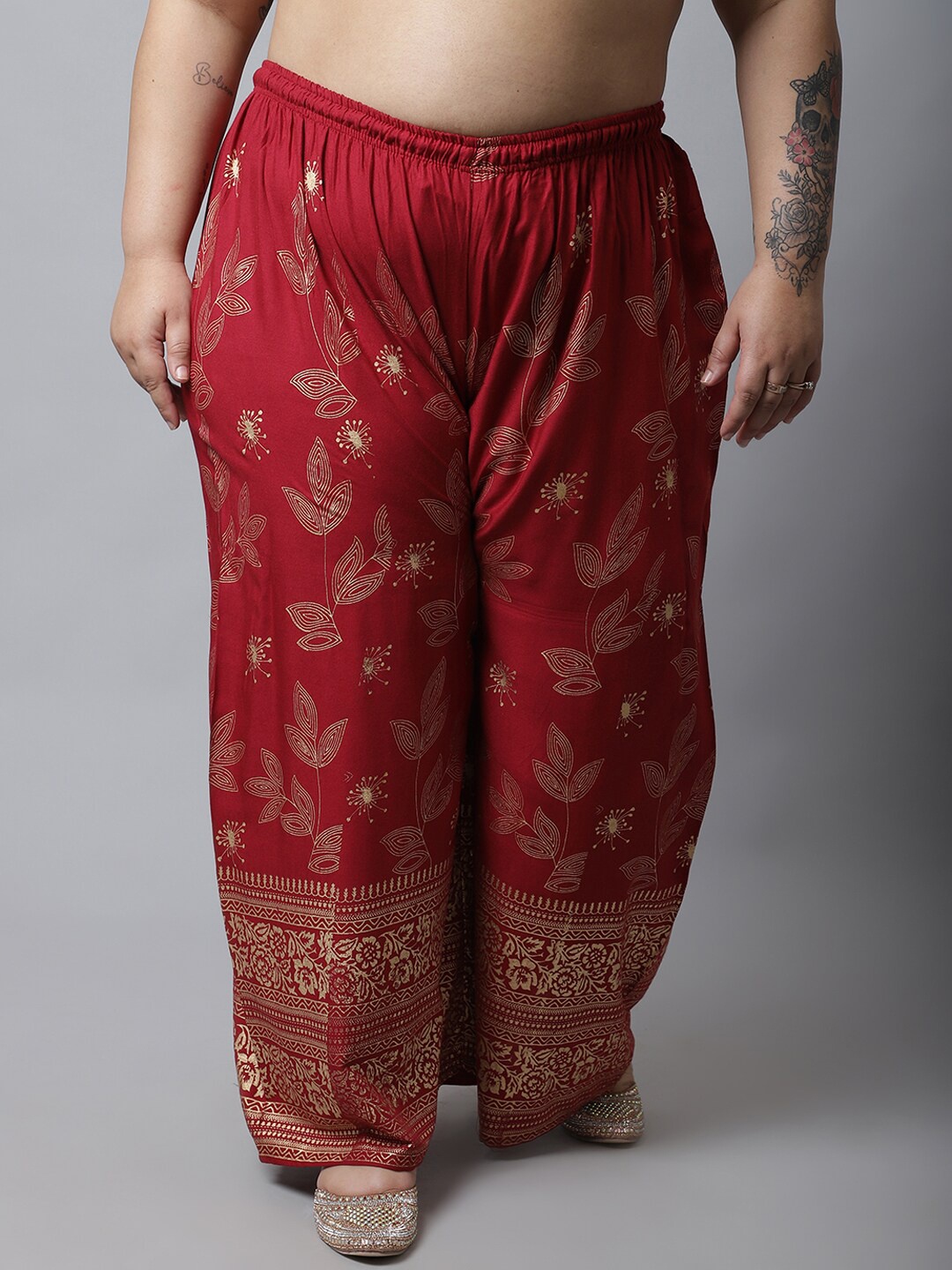 Miaz Lifestyle Women Maroon & Gold-Toned Cotton Plus Size Printed Knitted Ethnic Palazzos
Miaz Lifestyle Women Maroon & Gold-Toned Cotton Plus Size Printed Knitted Ethnic Palazzos