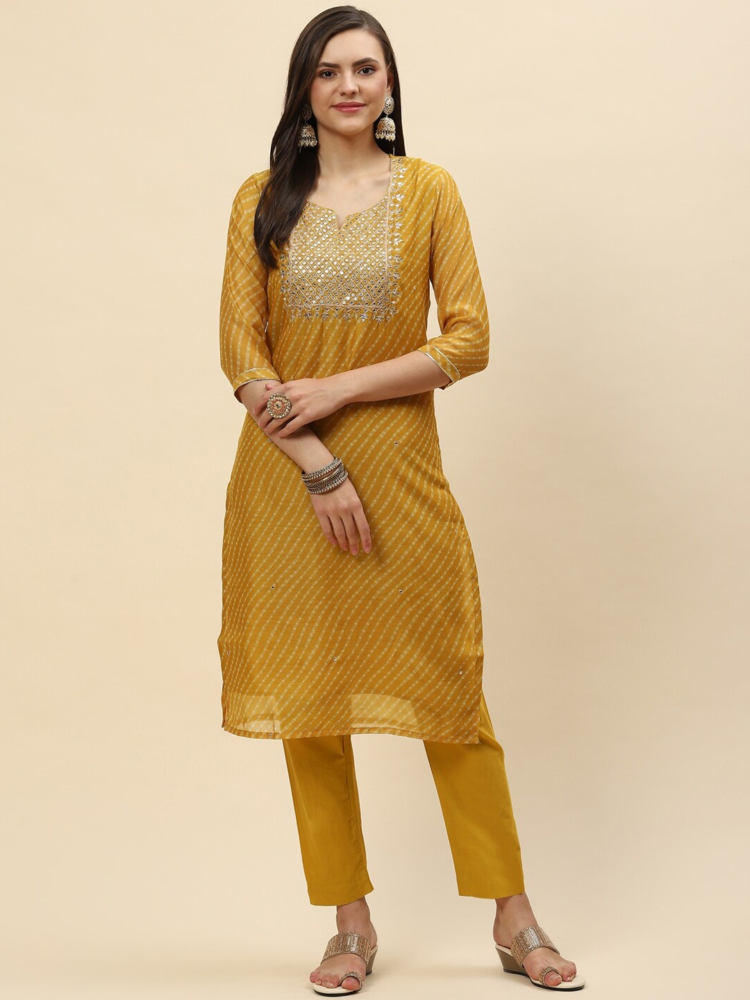 Meena Bazaar Women Mustard Yellow Leheriya Printed Chanderi Silk Kurta with Trousers
Meena Bazaar Women Mustard Yellow Leheriya Printed Chanderi Silk Kurta with Trousers