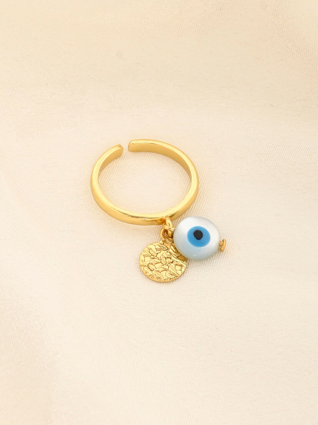 Mikoto by FableStreet Women Gold-Plated Evil Eye Textured Coin Adjustable Finger Ring
Mikoto by FableStreet Women Gold-Plated Evil Eye Textured Coin Adjustable Finger Ring