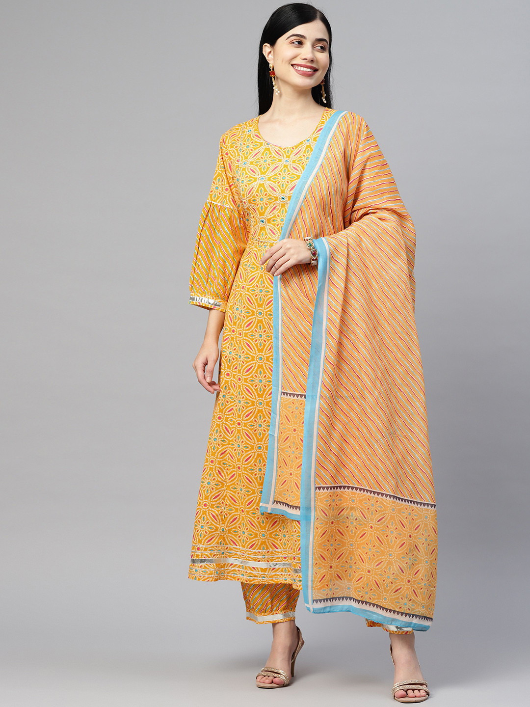 Readiprint Fashions Women Yellow Bandhani Printed Gotta Patti Cotton Kurta with Palazzos
Readiprint Fashions Women Yellow Bandhani Printed Gotta Patti Cotton Kurta with Palazzos