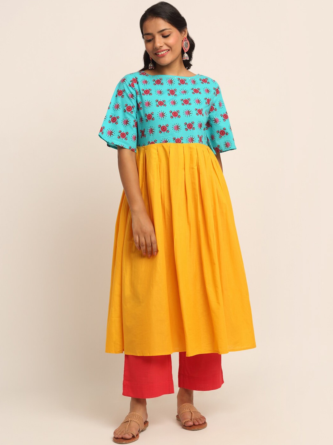 EK BY EKTA KAPOOR Women Blue & Yellow Floral Printed Boat Neck Bell Sleeve Cotton Kurta
EK BY EKTA KAPOOR Women Blue & Yellow Floral Printed Boat Neck Bell Sleeve Cotton Kurta
