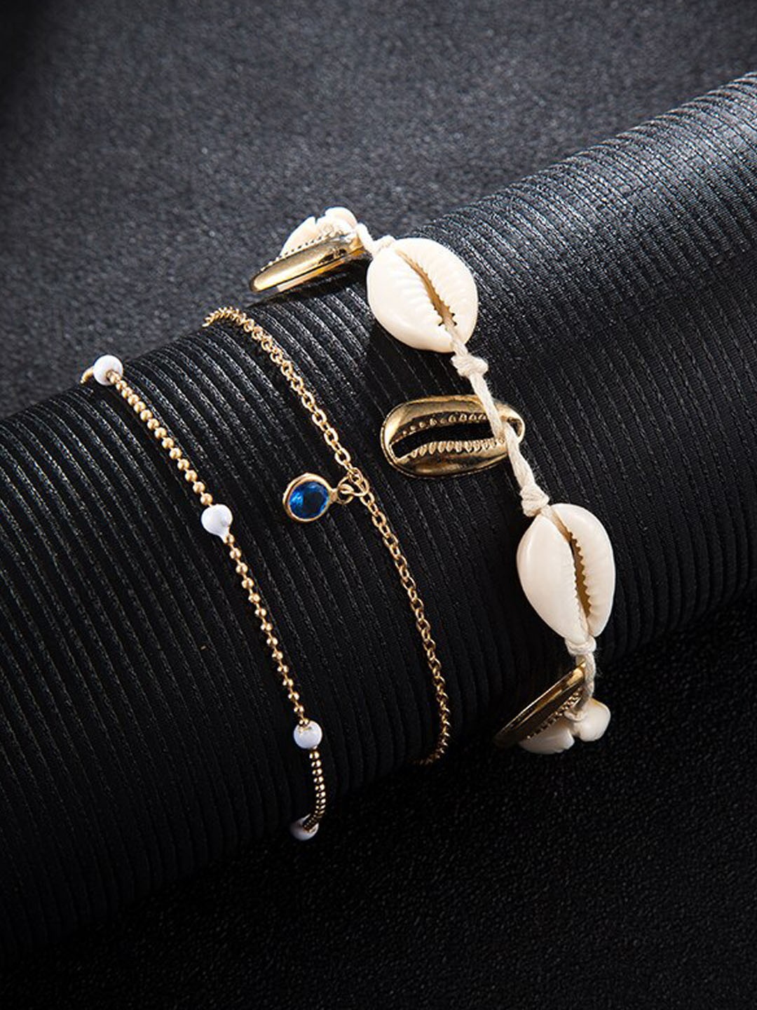 Young & Forever Set Of 3 Blue & White Crystal Studded Gold-Plated Shell Charm Anklets
Young & Forever Set Of 3 Blue & White Crystal Studded Gold-Plated Shell Charm Anklets