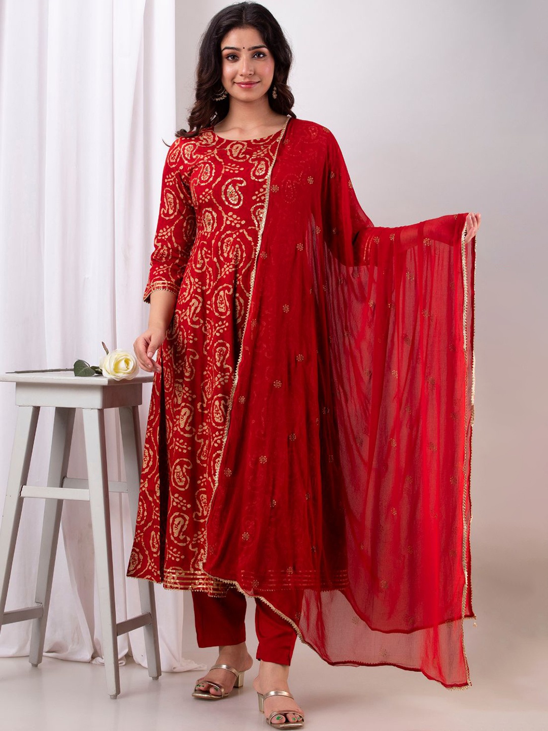 Kesarya Women Red & Beige Paisley Printed Sequinned Kurta with Trouser & Dupatta Set
Kesarya Women Red & Beige Paisley Printed Sequinned Kurta with Trouser & Dupatta Set