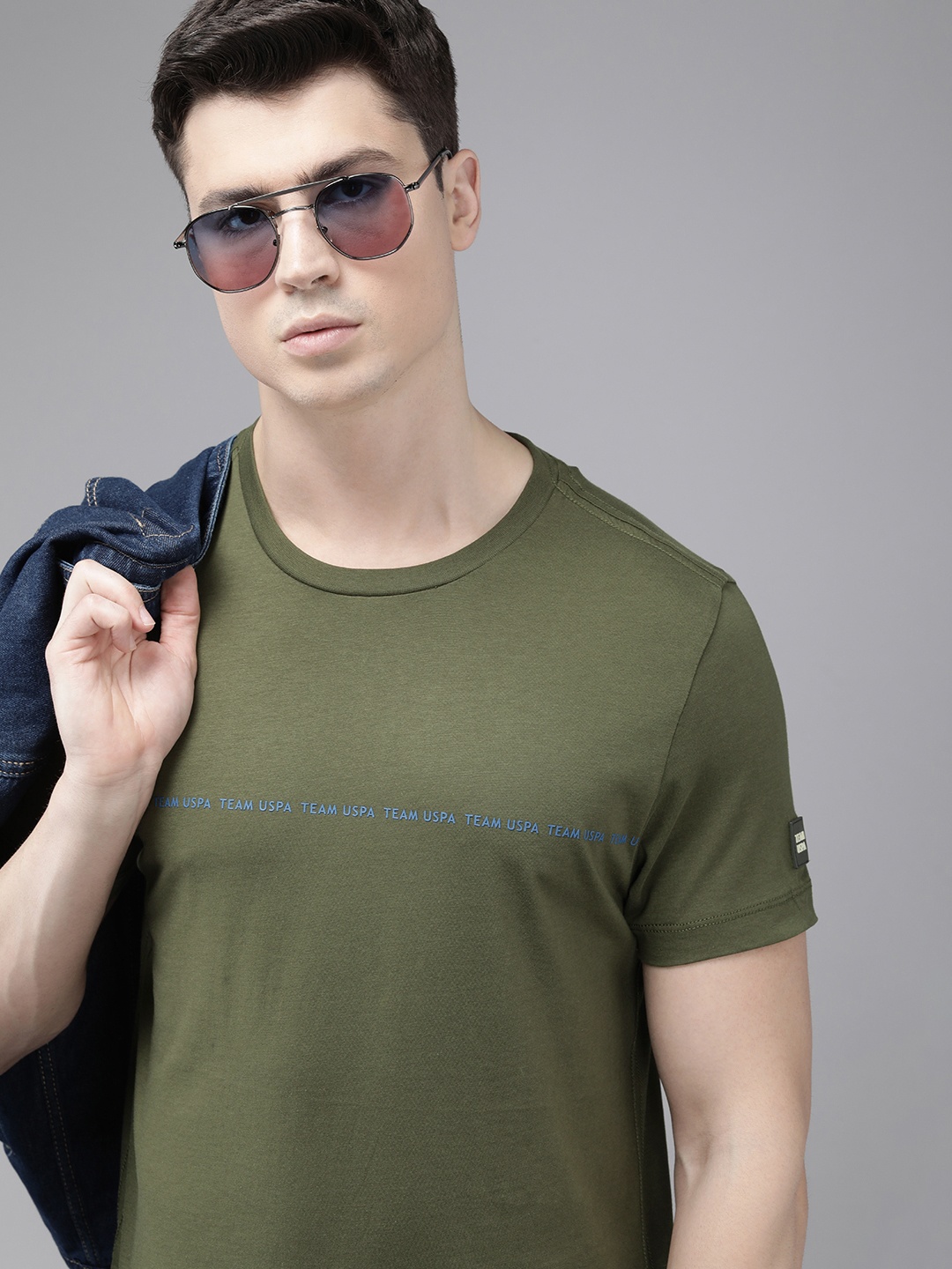 U.S. Polo Assn. Denim Co. Men Solid Pure Cotton Round Neck T-shirt With Typography Detail, Olive
U.S. Polo Assn. Denim Co. Men Solid Pure Cotton Round Neck T-shirt With Typography Detail, Olive