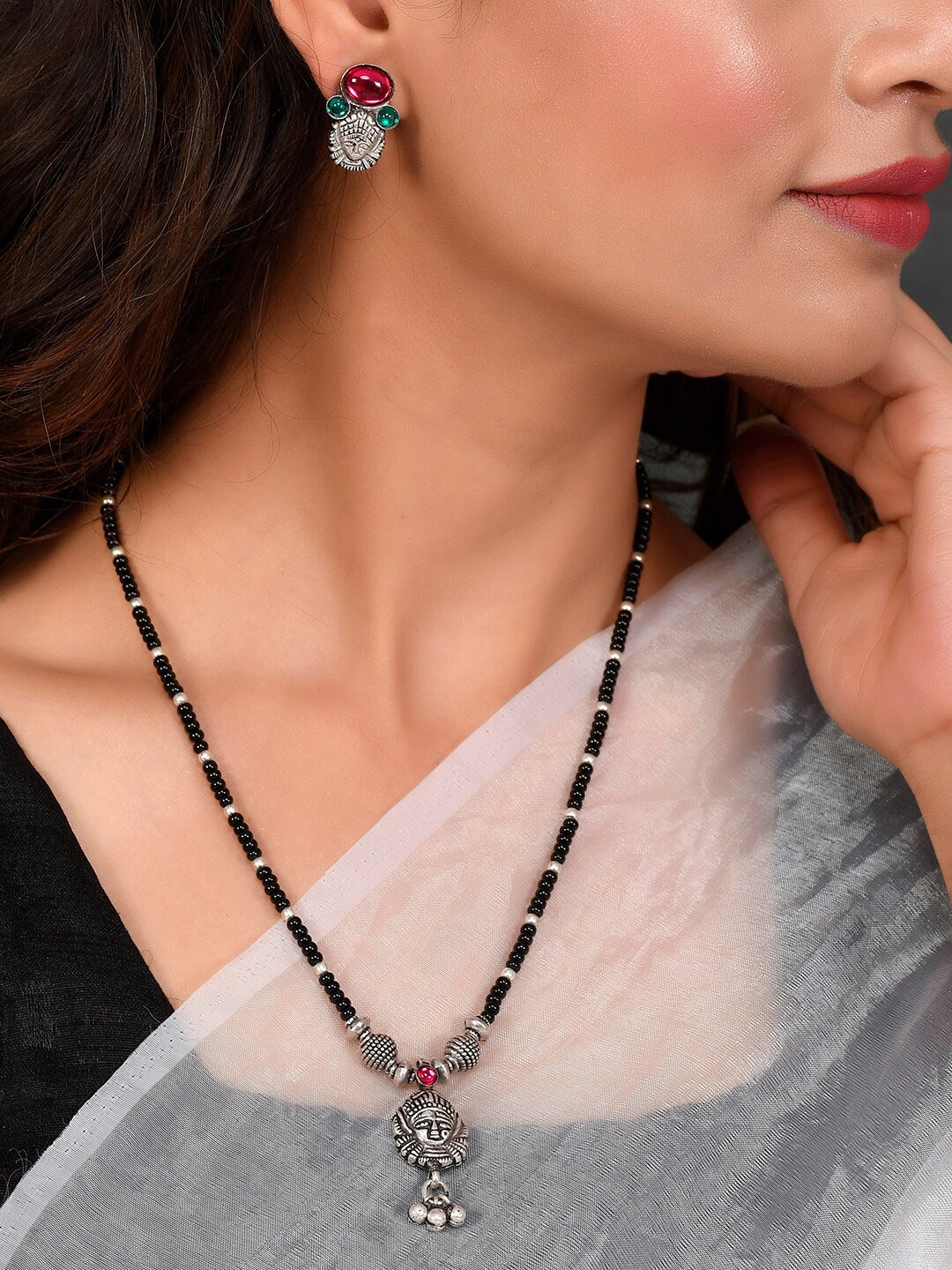 AQUASTREET JEWELS Silver Plated Oxidized Stone Studded & Beaded Mangalsutra Set, Black
AQUASTREET JEWELS Silver Plated Oxidized Stone Studded & Beaded Mangalsutra Set, Black