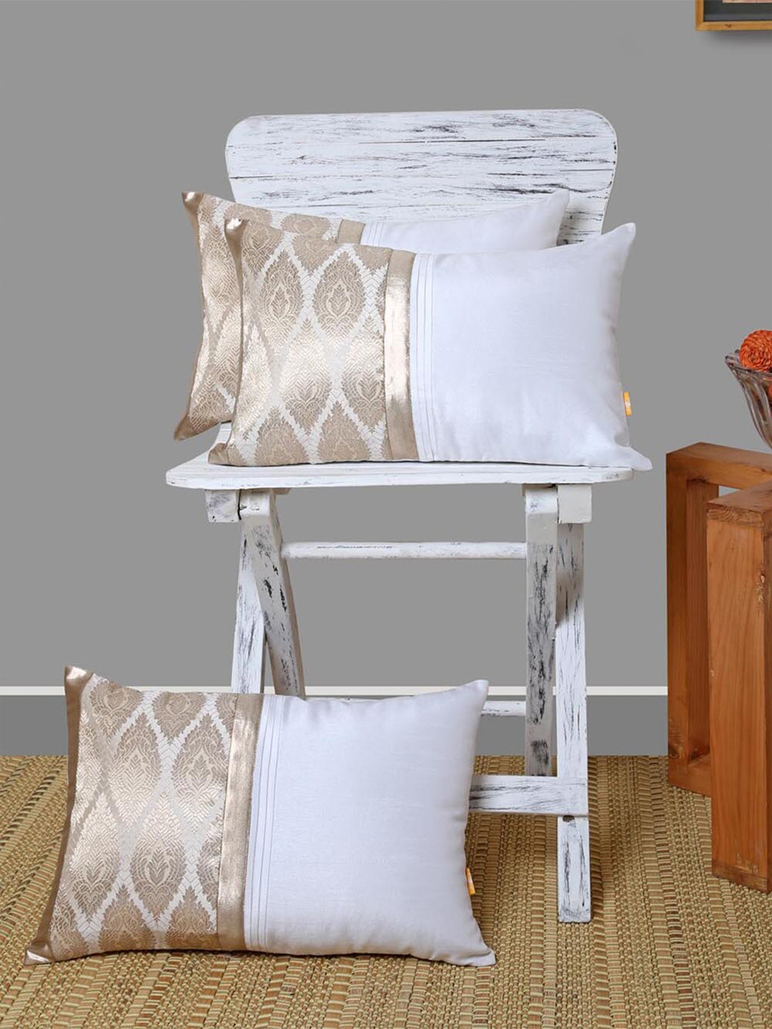 ANS Off White & Gold-Toned Set of 3 Ethnic Motifs Rectangle Cushion Covers 
ANS Off White & Gold-Toned Set of 3 Ethnic Motifs Rectangle Cushion Covers