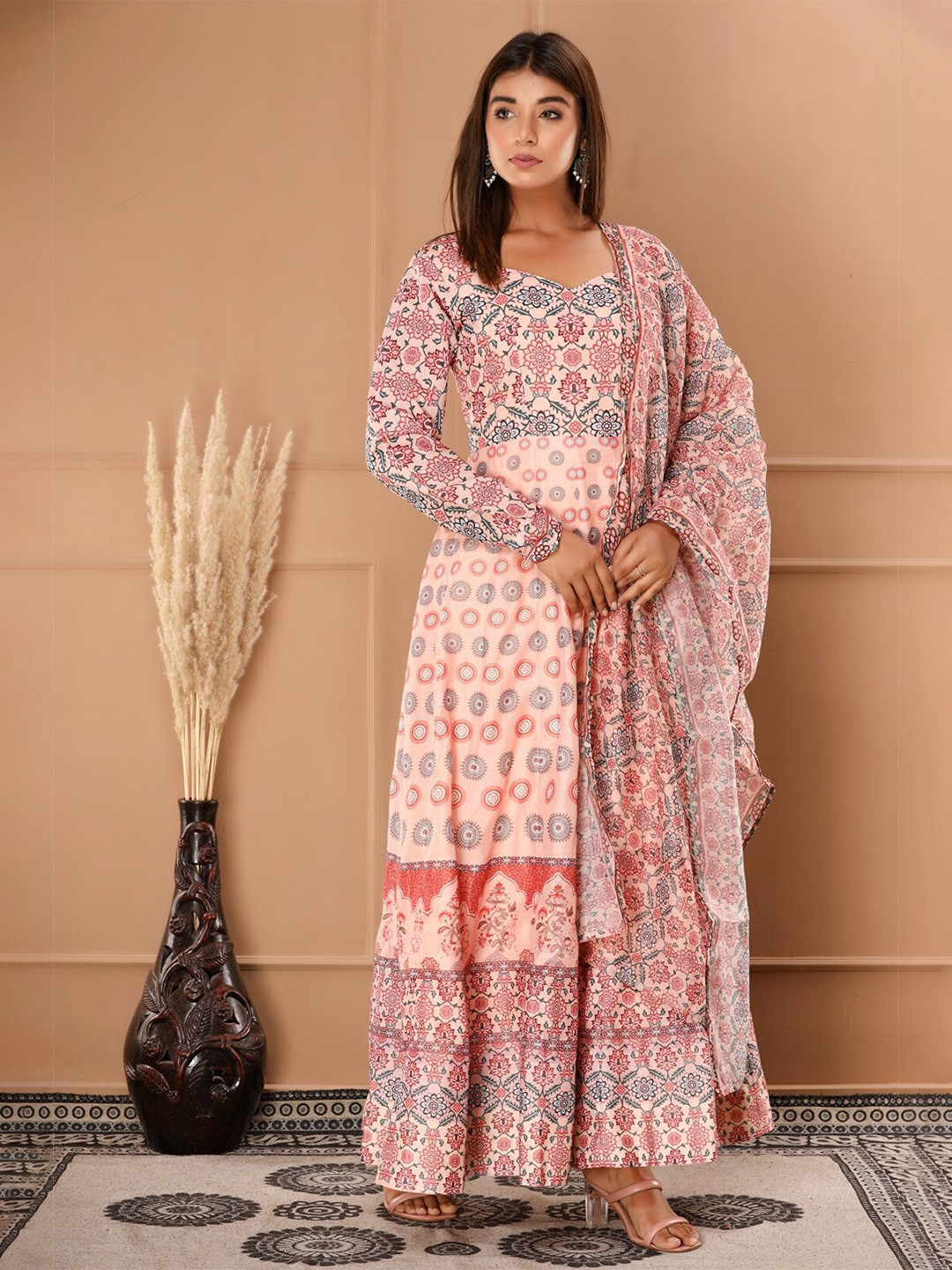 IRIDAA JAIPUR Women Peach-Coloured Ethnic Motifs Printed Anarkali Kurta With Dupatta
IRIDAA JAIPUR Women Peach-Coloured Ethnic Motifs Printed Anarkali Kurta With Dupatta