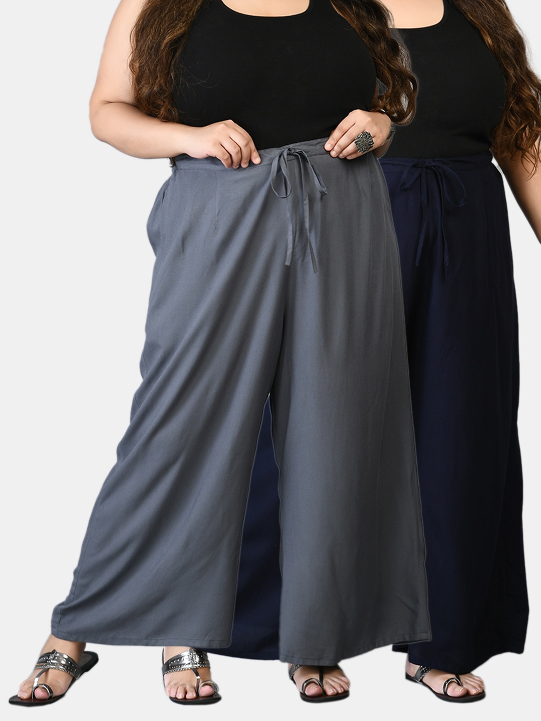 PrettyPlus by Desinoor.com Women Plus Size Pack Of 2 Navy Blue & Grey Solid Palazzos
PrettyPlus by Desinoor.com Women Plus Size Pack Of 2 Navy Blue & Grey Solid Palazzos