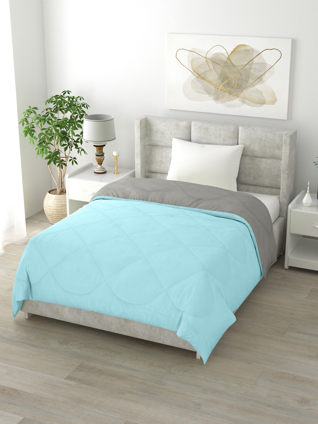 Clasiko Turquoise Blue & Grey Solid Mild Winter 200 GSM Reversible Single Bed Comforter
Clasiko Turquoise Blue & Grey Solid Mild Winter 200 GSM Reversible Single Bed Comforter