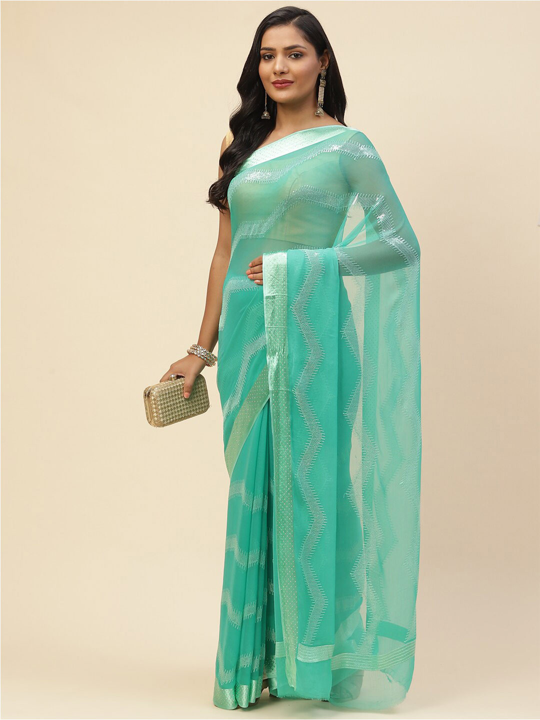 Meena Bazaar Women Sea Green & Silver-Toned Sequinned Saree
Meena Bazaar Women Sea Green & Silver-Toned Sequinned Saree