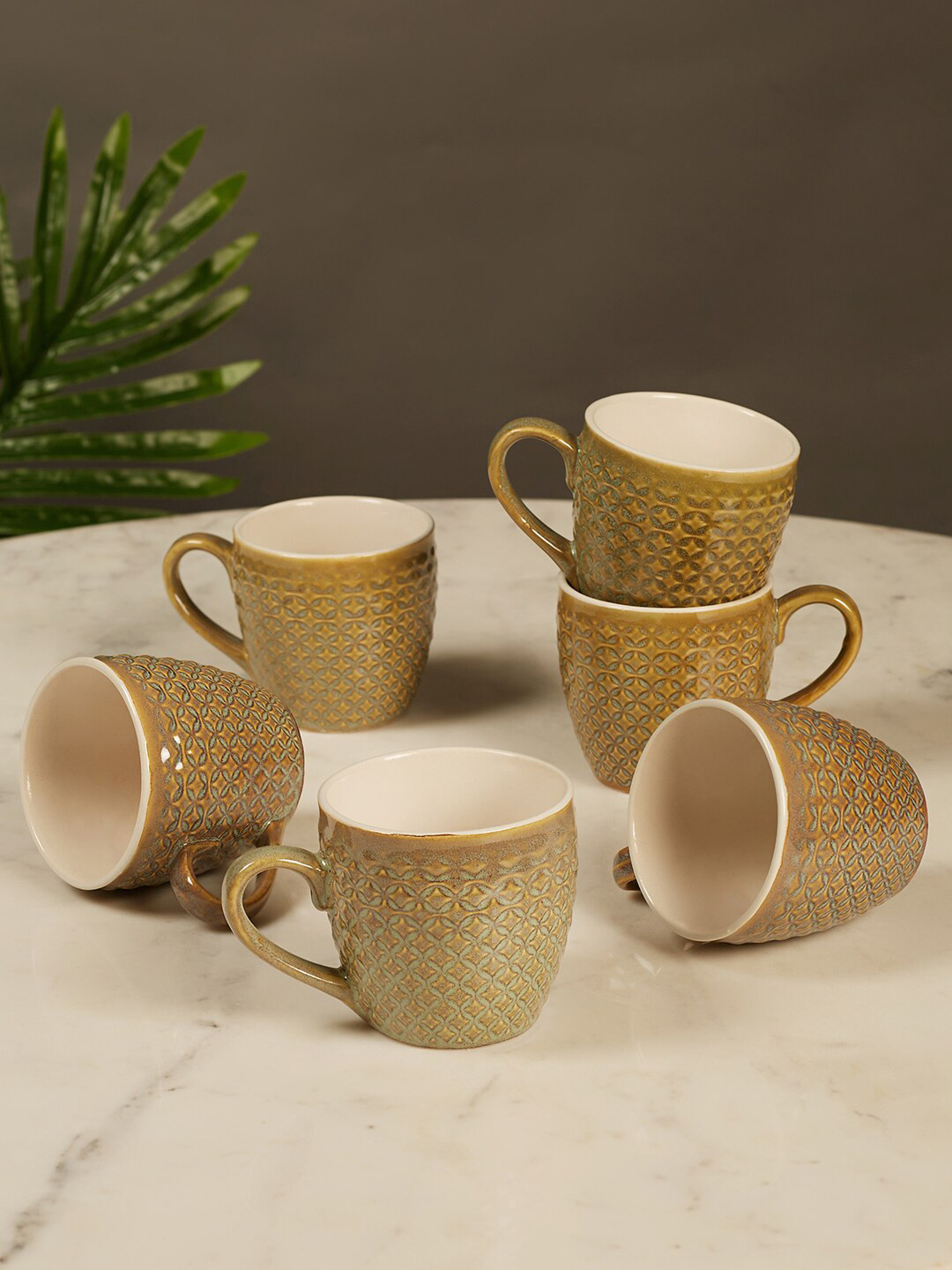 HomeTown Green & Off White Pack Of 6 Microwave Safe Textured Ceramic Mugs 220 ml Each
HomeTown Green & Off White Pack Of 6 Microwave Safe Textured Ceramic Mugs 220 ml Each