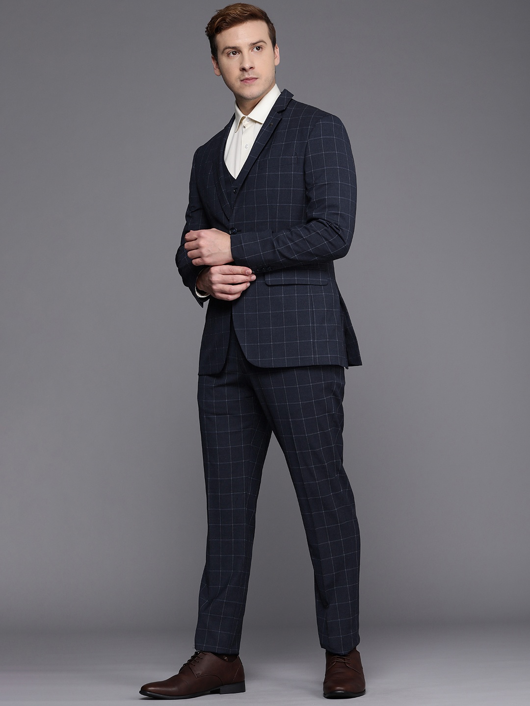 Louis Philippe Men Navy Blue Checked Slim-Fit Single-Breasted Three-Piece Formal Suit
Louis Philippe Men Navy Blue Checked Slim-Fit Single-Breasted Three-Piece Formal Suit