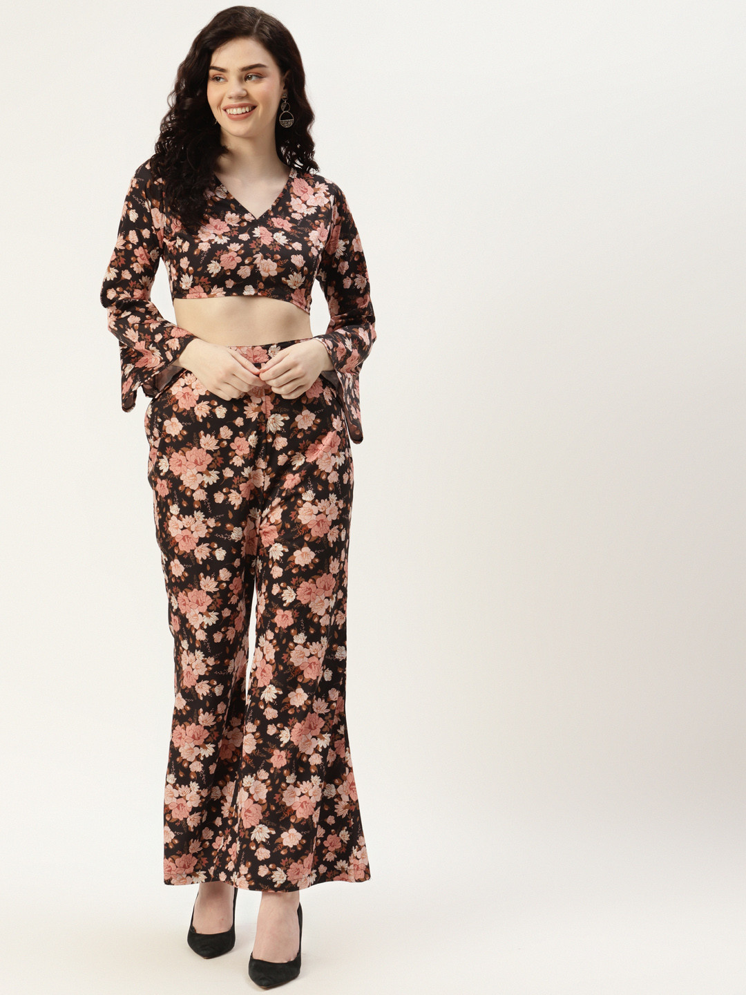 Sleek Italia Women Black Floral Printed Top With Palazzos
Sleek Italia Women Black Floral Printed Top With Palazzos
