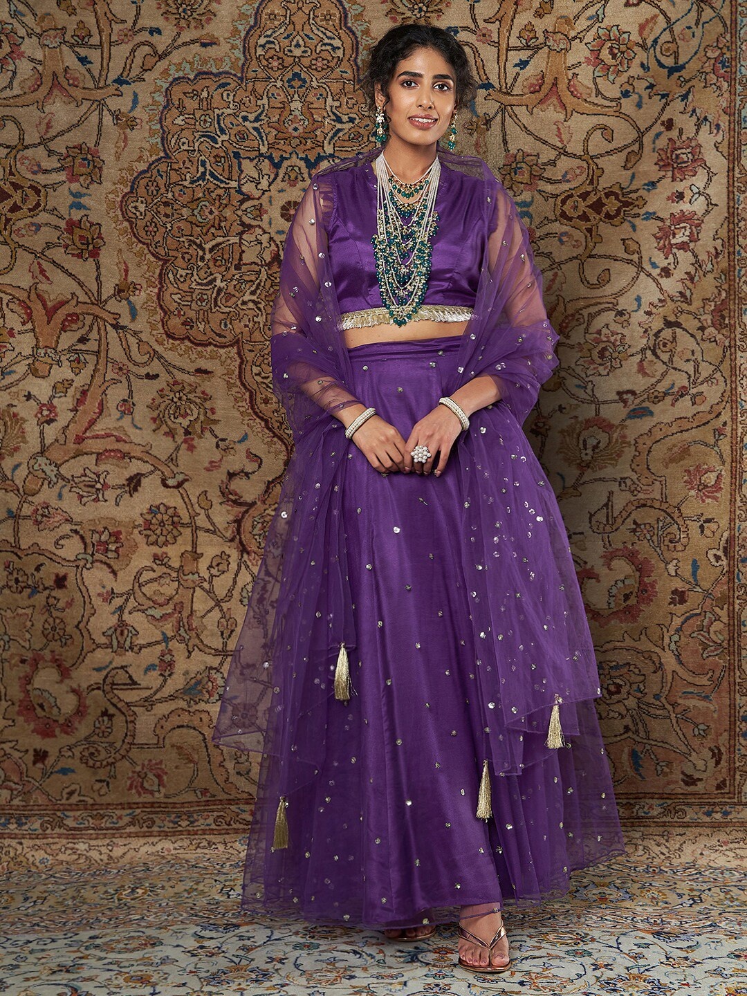 Shae by SASSAFRAS Purple & Gold-Toned Sequinned Ready to Wear Lehenga & Blouse With Dupatta
Shae by SASSAFRAS Purple & Gold-Toned Sequinned Ready to Wear Lehenga & Blouse With Dupatta