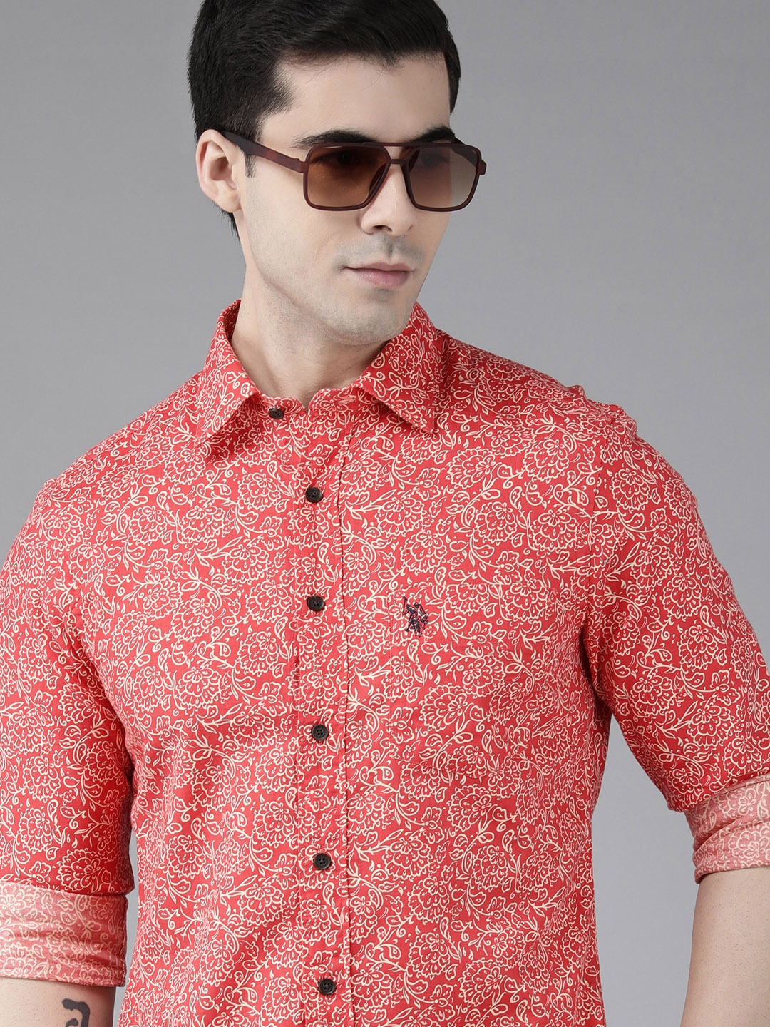 U S Polo Assn Men Coral Red And White Tailored Fit Floral Printed Pure Cotton Casual Shirt
U S Polo Assn Men Coral Red And White Tailored Fit Floral Printed Pure Cotton Casual Shirt