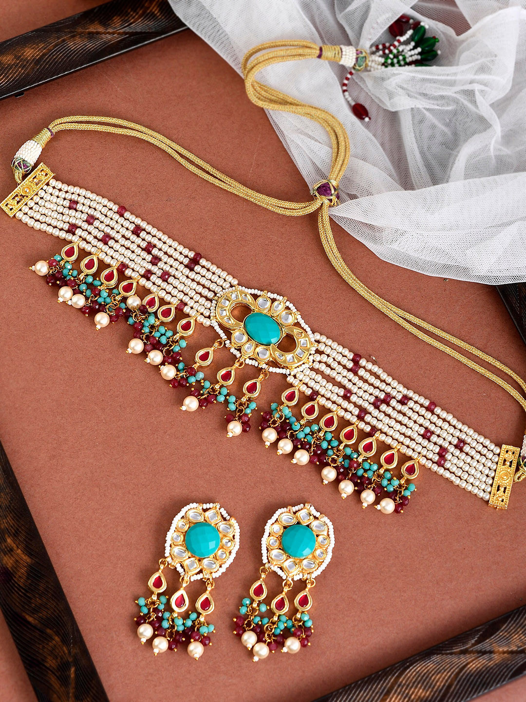 DASTOOR Gold-Plated Red & Blue Kundan-Studded & Beaded Designer Jewellery Set
DASTOOR Gold-Plated Red & Blue Kundan-Studded & Beaded Designer Jewellery Set