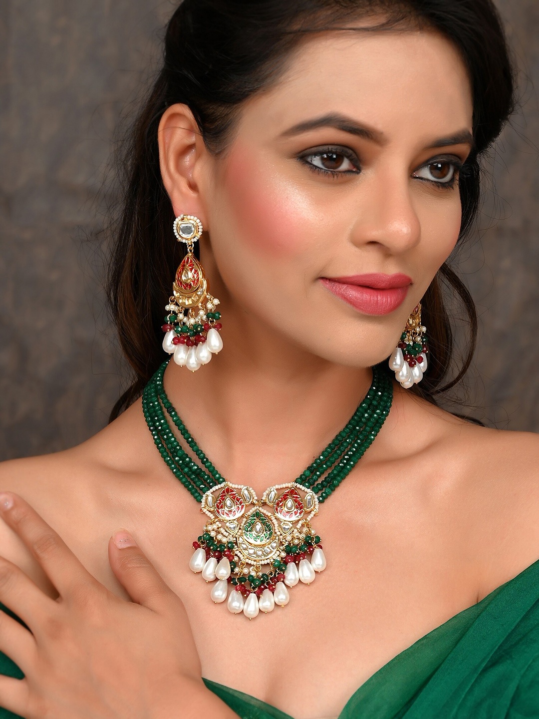 DASTOOR Women Green & White Gold-Plated Kundan Studded & Beaded Necklace and Earrings
DASTOOR Women Green & White Gold-Plated Kundan Studded & Beaded Necklace and Earrings