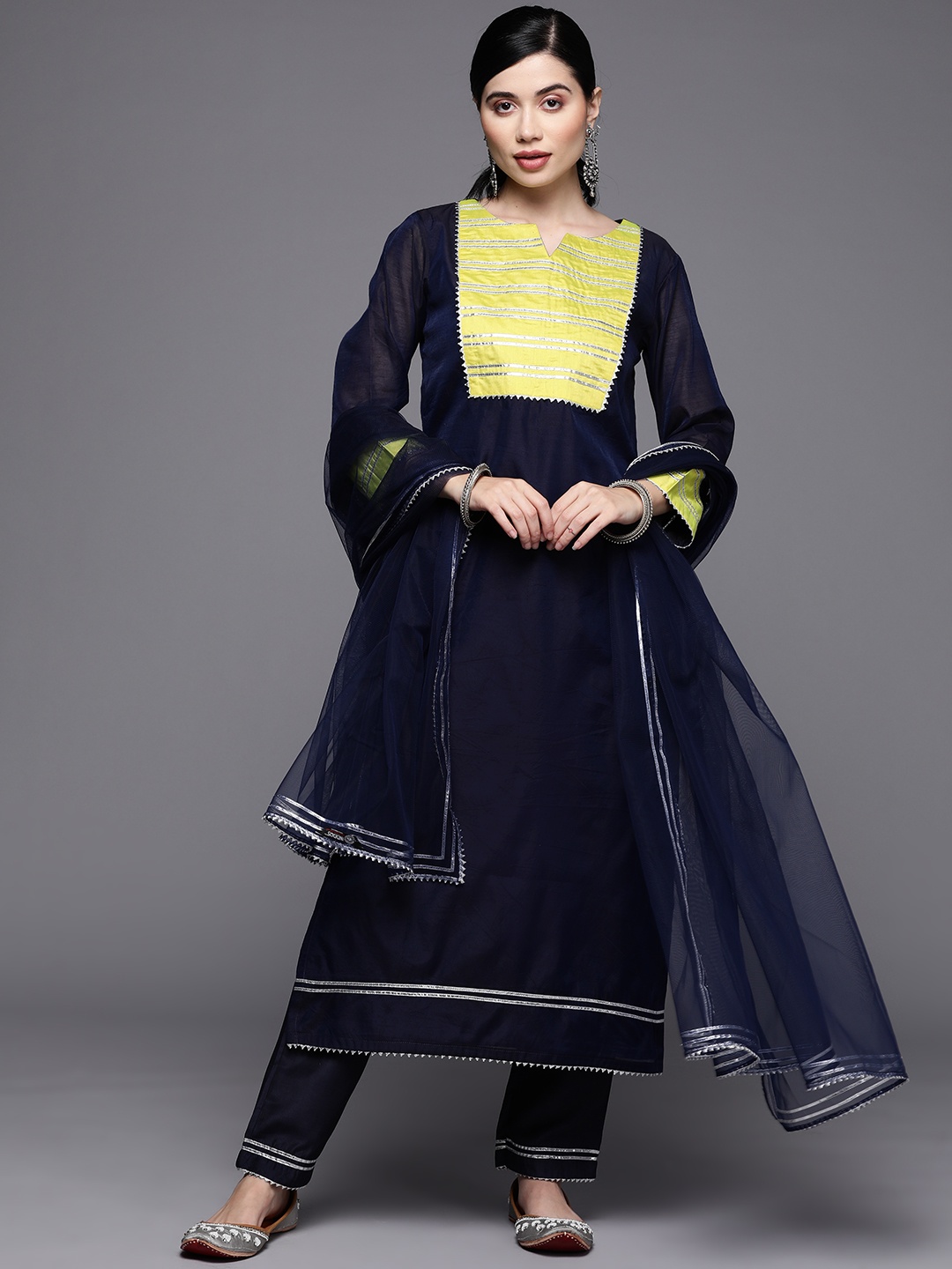 Inddus Women Navy Blue & Yellow Yoke Design Gotta Patti Chanderi Kurta with Trousers & Dupatta
Inddus Women Navy Blue & Yellow Yoke Design Gotta Patti Chanderi Kurta with Trousers & Dupatta