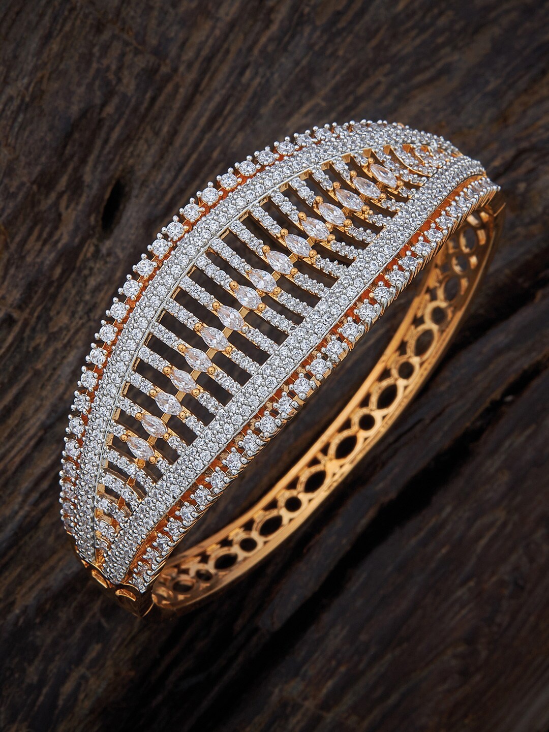 Kushal's Fashion Jewellery Women Gold-Toned & White Cubic Zirconia Gold-Plated Kada Bracelet
Kushal's Fashion Jewellery Women Gold-Toned & White Cubic Zirconia Gold-Plated Kada Bracelet