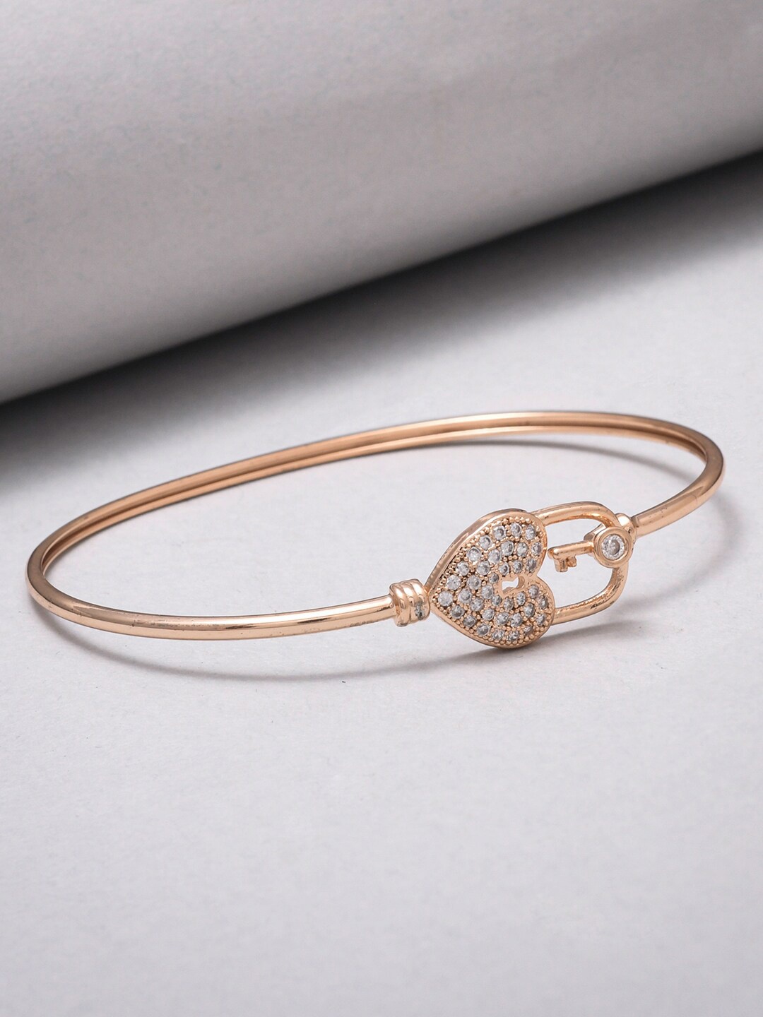 Voylla Women Rose Gold & White Brass Cubic Zirconia Rose Gold-Plated Bangle-Style Bracelet
Voylla Women Rose Gold & White Brass Cubic Zirconia Rose Gold-Plated Bangle-Style Bracelet