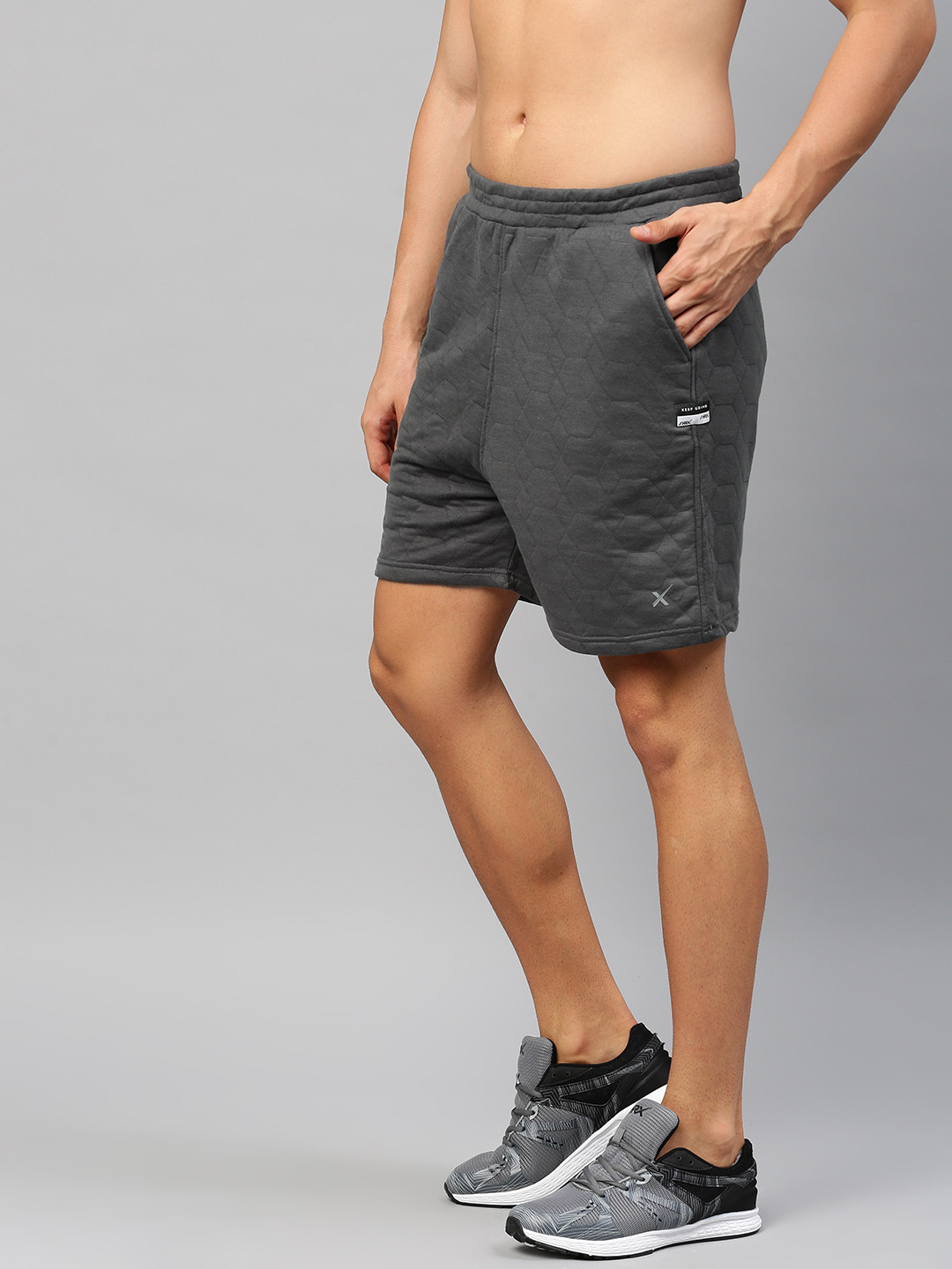HRX by Hrithik Roshan Men Charcoal Grey Self-Design Sports Shorts
HRX by Hrithik Roshan Men Charcoal Grey Self-Design Sports Shorts