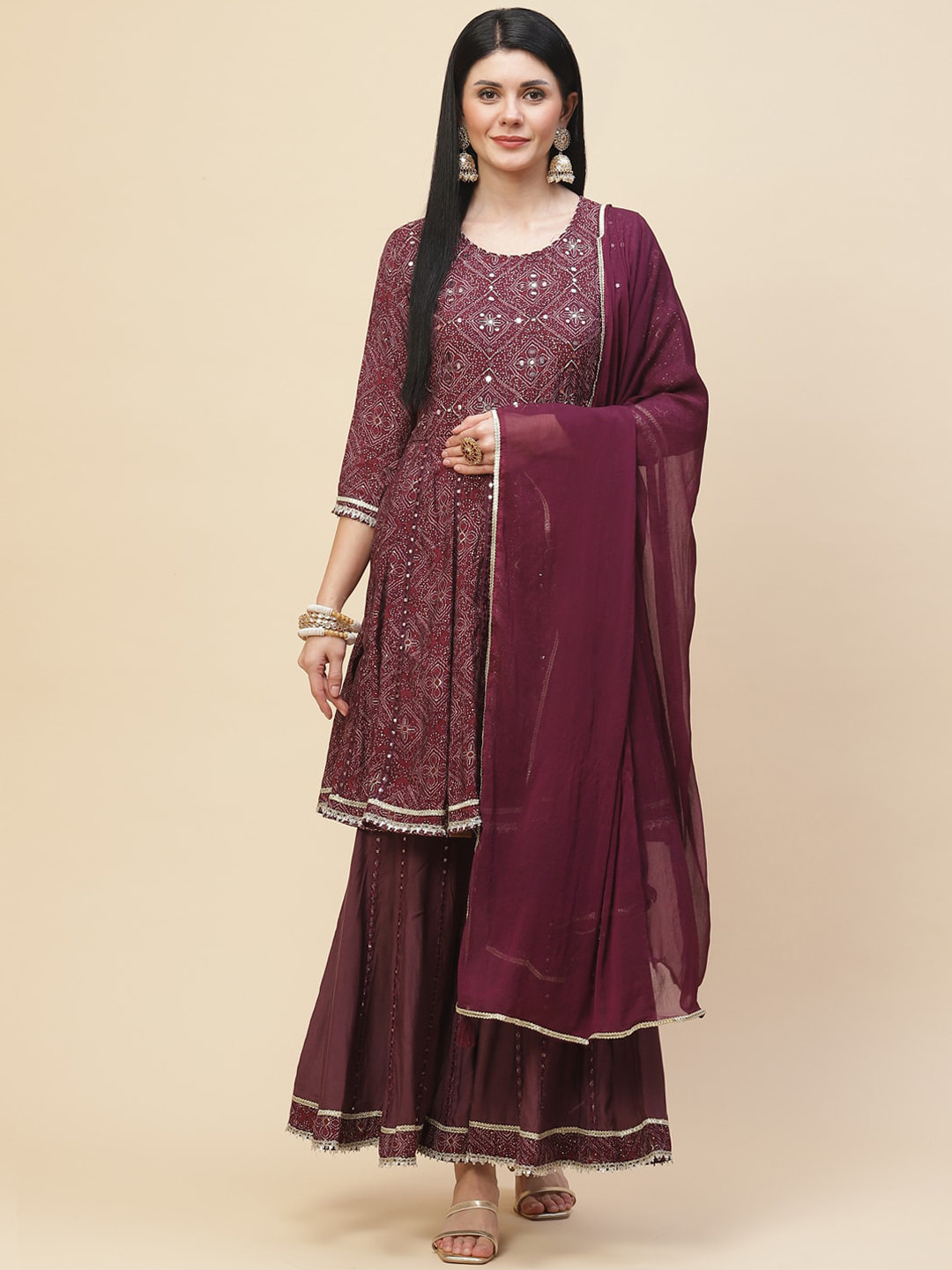 Meena Bazaar Women Burgundy Embroidered Cotton Kurta with Sharara & With Dupatta
Meena Bazaar Women Burgundy Embroidered Cotton Kurta with Sharara & With Dupatta