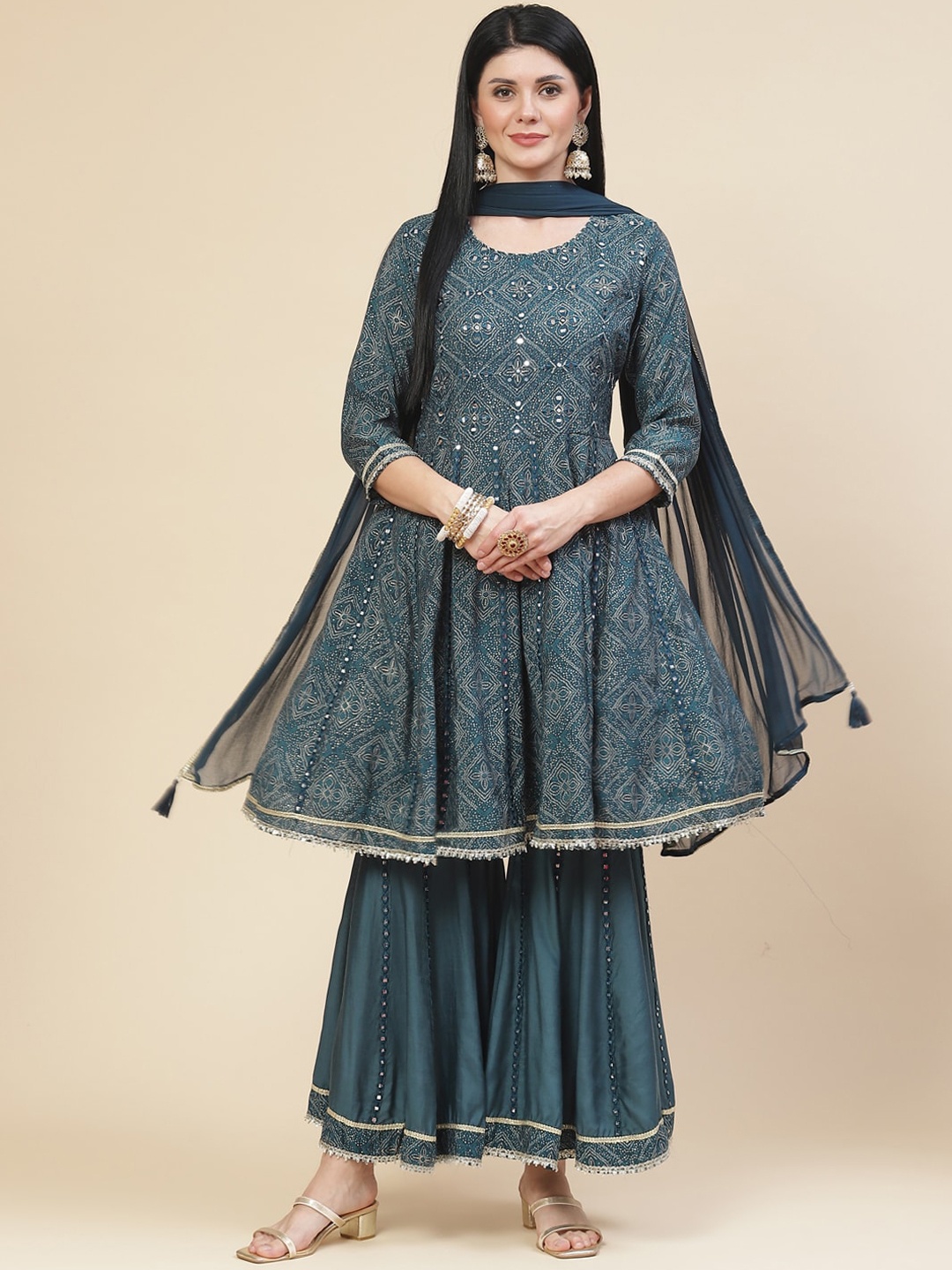 Meena Bazaar Women Blue Ethnic Motifs Printed Mirror Work Kurta with Sharara & With Dupatta
Meena Bazaar Women Blue Ethnic Motifs Printed Mirror Work Kurta with Sharara & With Dupatta