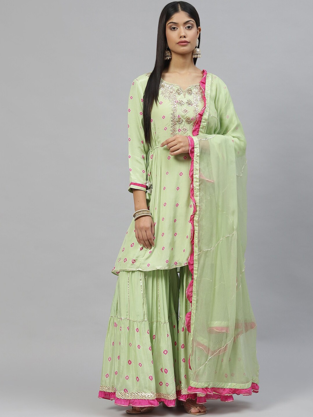 Divena Women Green Bandhani Printed Zardozi Chanderi Silk Kurta with Sharara & With Dupatta
Divena Women Green Bandhani Printed Zardozi Chanderi Silk Kurta with Sharara & With Dupatta
