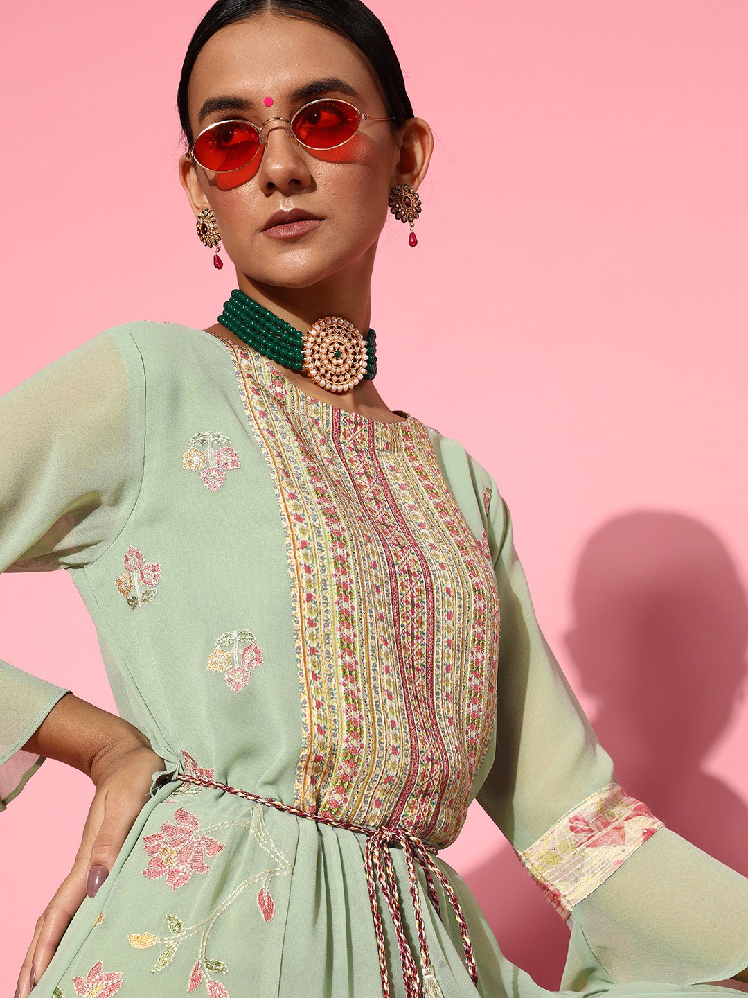 ZOLA Women Green Ethnic Motifs Printed Bell Sleeves Belted Detail Georgette Anarkali Kurta
ZOLA Women Green Ethnic Motifs Printed Bell Sleeves Belted Detail Georgette Anarkali Kurta
