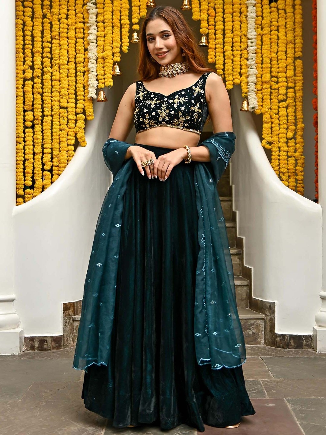 Lavanya The Label Teal & Gold-Toned Embellished Zardozi Ready to Wear Lehenga & Blouse With Dupatta
Lavanya The Label Teal & Gold-Toned Embellished Zardozi Ready to Wear Lehenga & Blouse With Dupatta