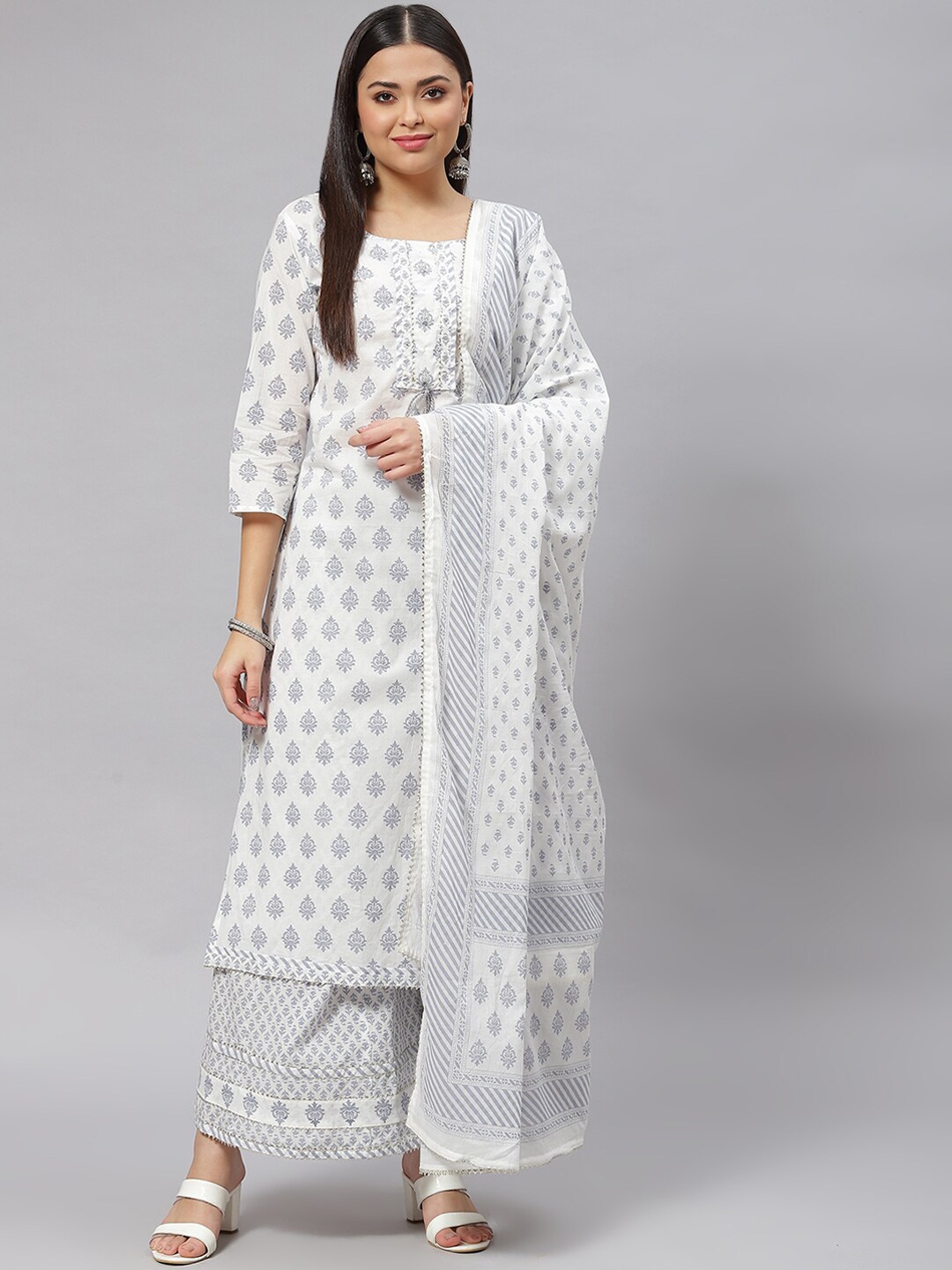 Divena Women White Ethnic Motifs Printed Pure Cotton Kurta with Palazzo & Dupatta Set
Divena Women White Ethnic Motifs Printed Pure Cotton Kurta with Palazzo & Dupatta Set