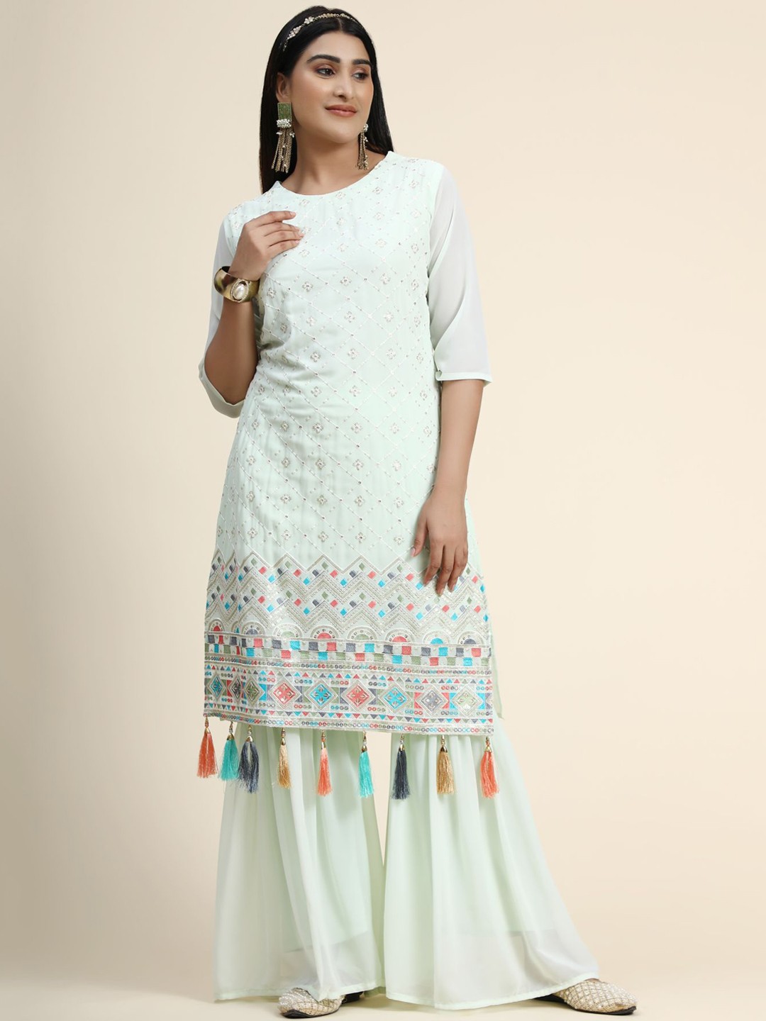 KALINI Women Green Ethnic Motifs Embroidered Sequinned Kurta with Sharara & With Dupatta
KALINI Women Green Ethnic Motifs Embroidered Sequinned Kurta with Sharara & With Dupatta