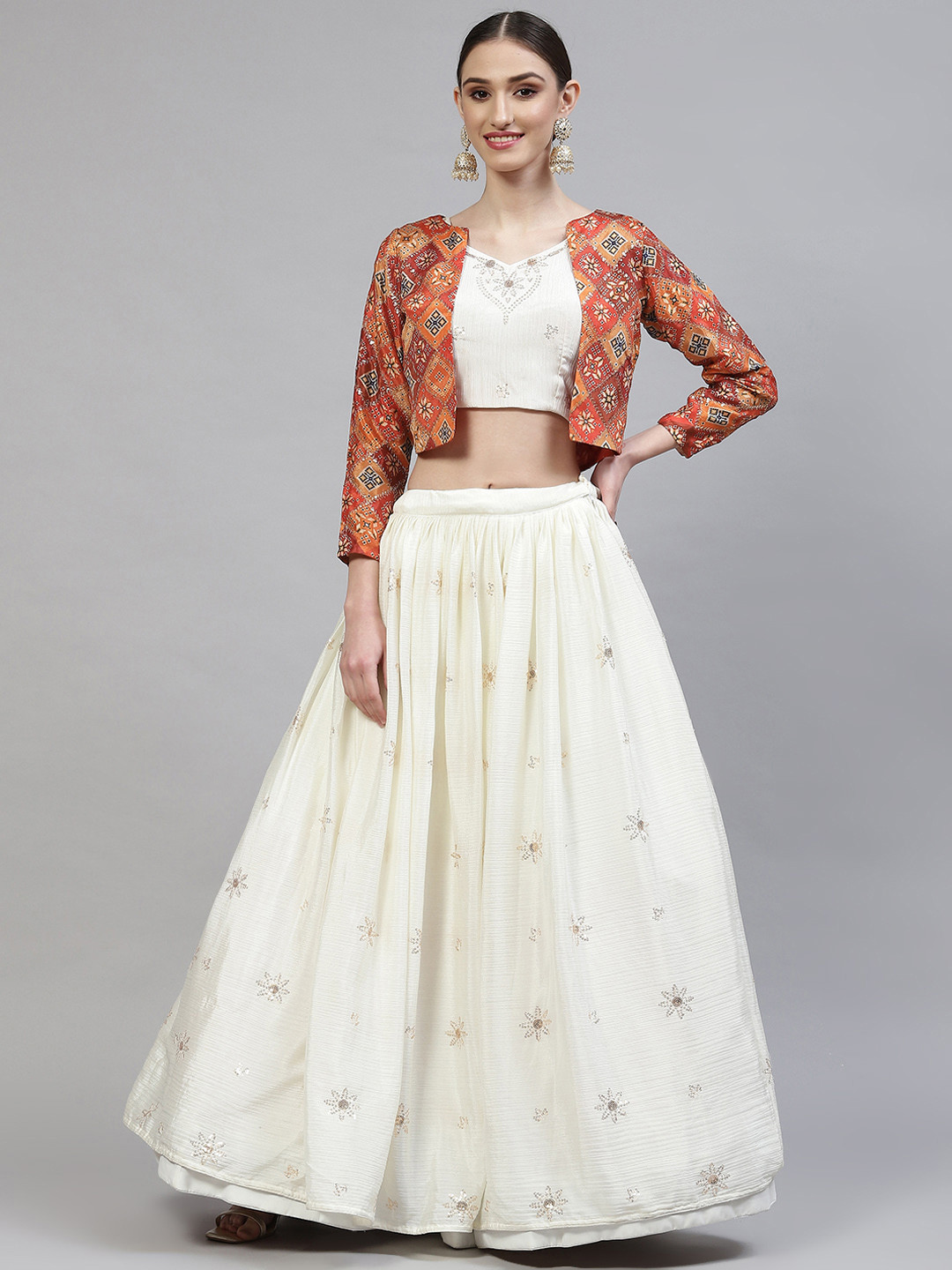 SHUBHKALA Off-White Embroidered Sequinned Semi-Stitched Lehenga & Blouse with Jacket 
SHUBHKALA Off-White Embroidered Sequinned Semi-Stitched Lehenga & Blouse with Jacket
